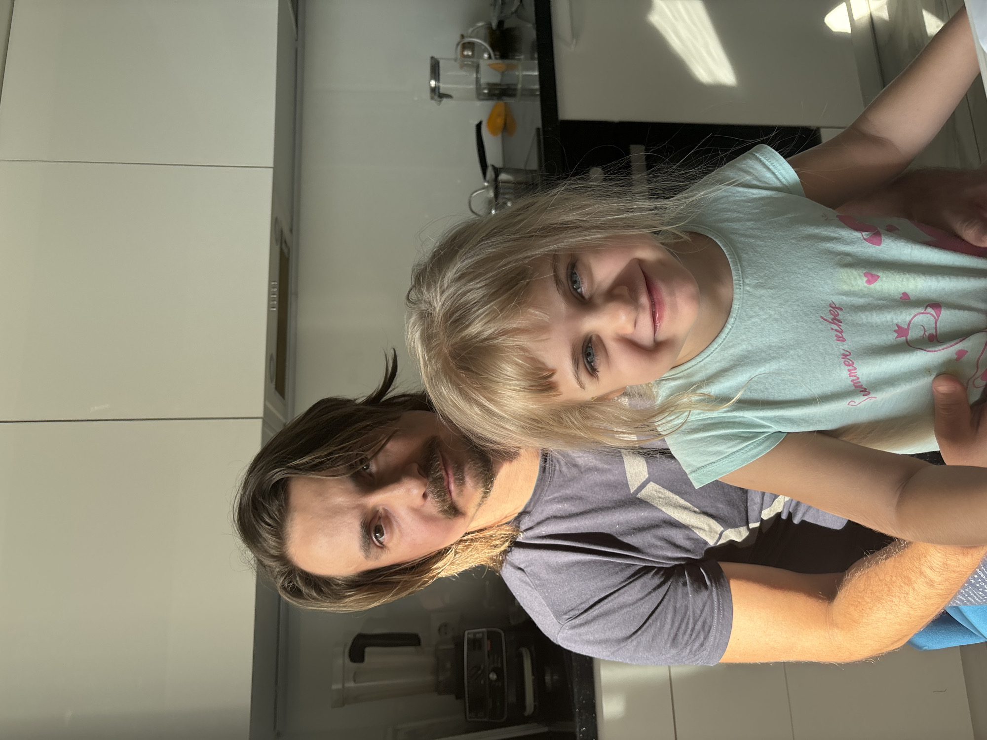 Family moments captured during afternoon in domestic indoor settings