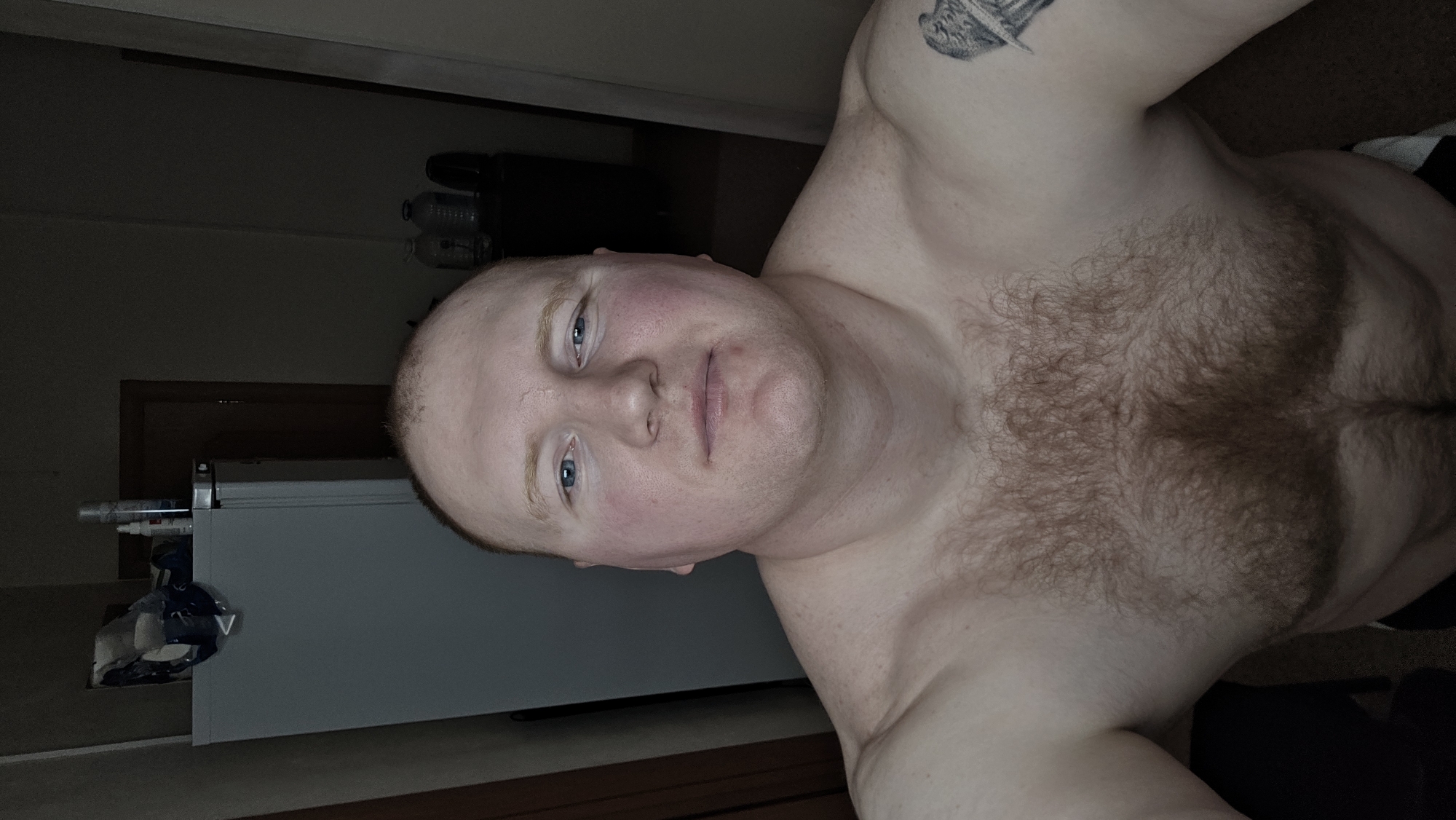 Man takes selfie indoors in Russia