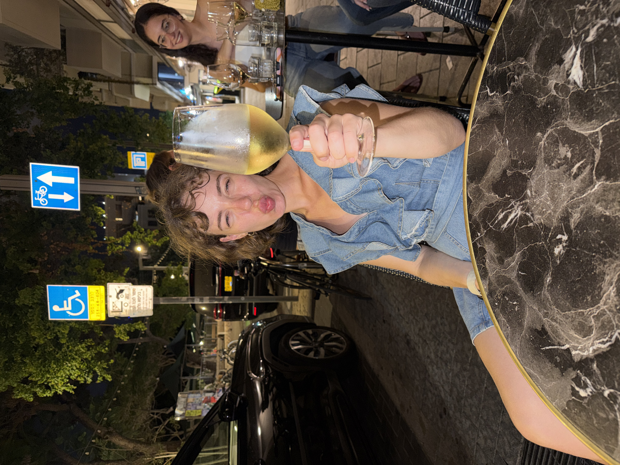 Nighttime cafe wine moment in Tel Aviv