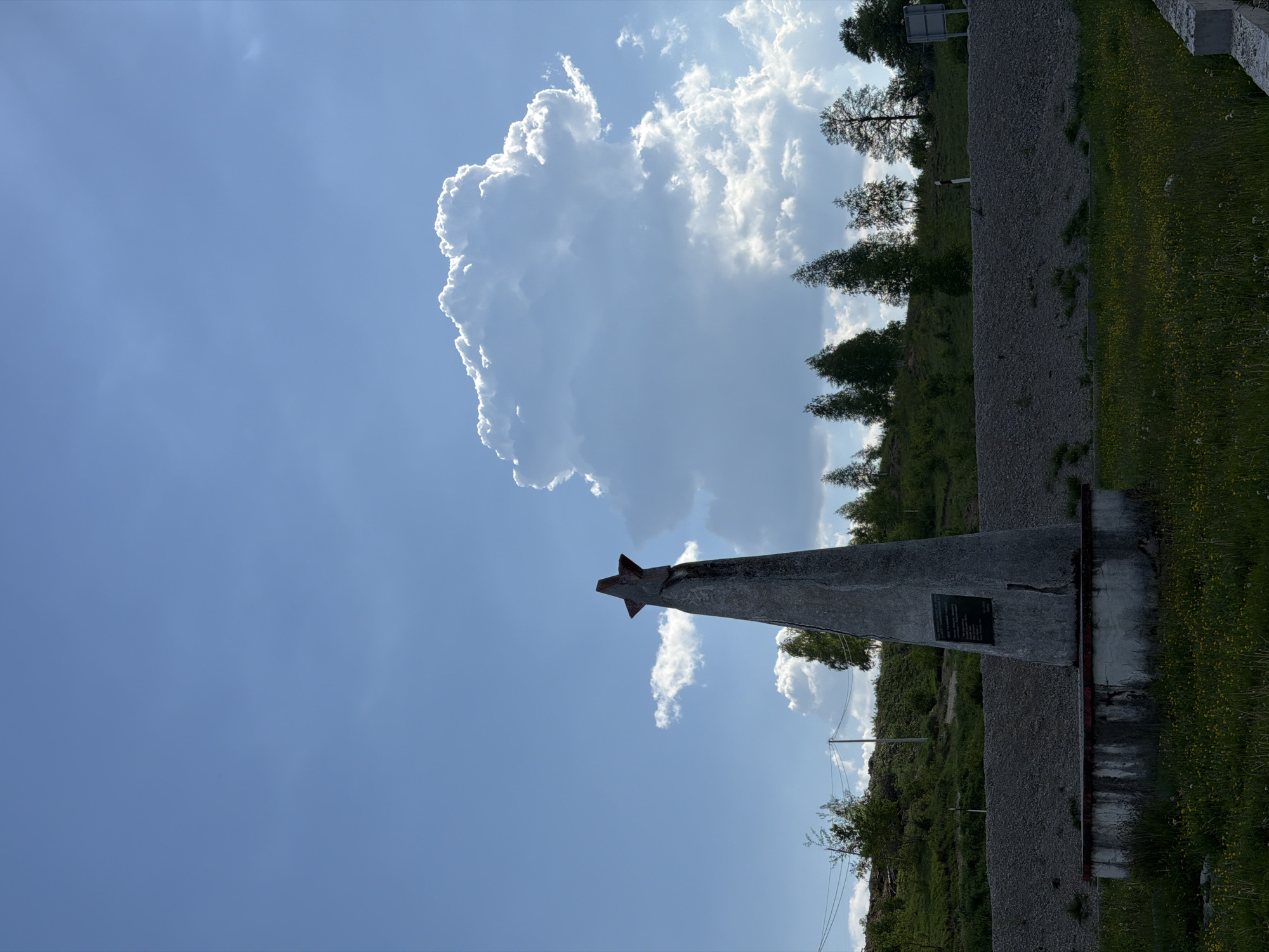 Star-topped triangular monument photographed in Marina Šuma, Montenegro