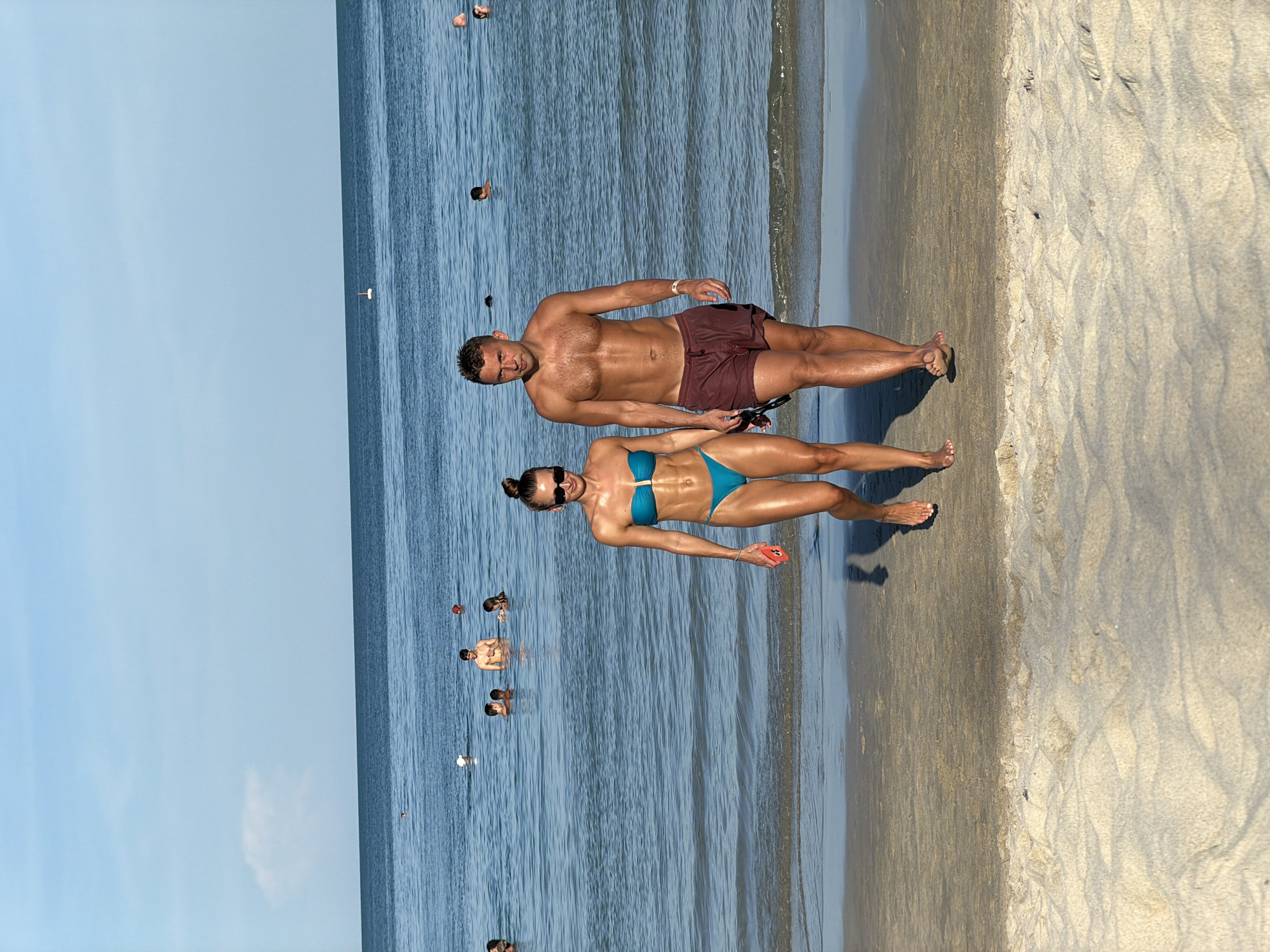 Chaweng Beach midmorning: sun, sand, and shallow water.
