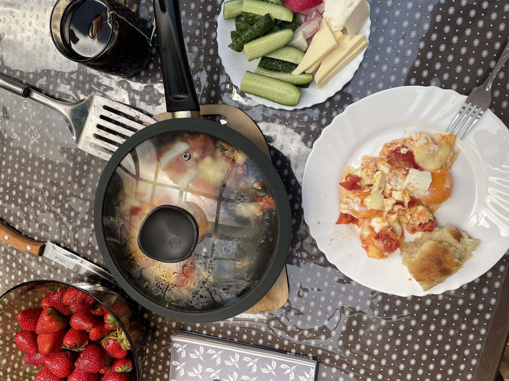 Seaside breakfast spread on a sunny morning terrace