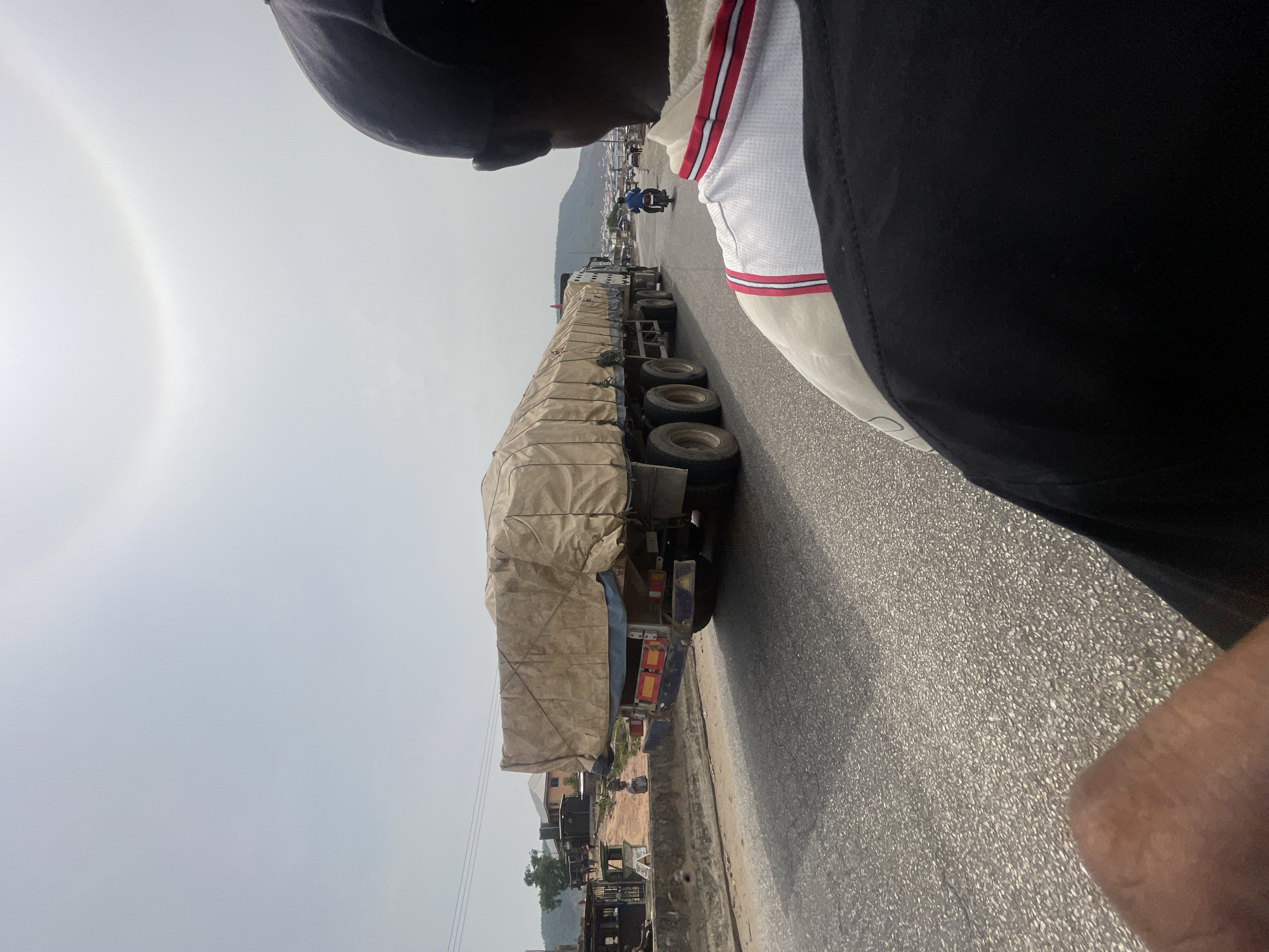 Road scene captured from moving vehicle in Lokoja, Nigeria