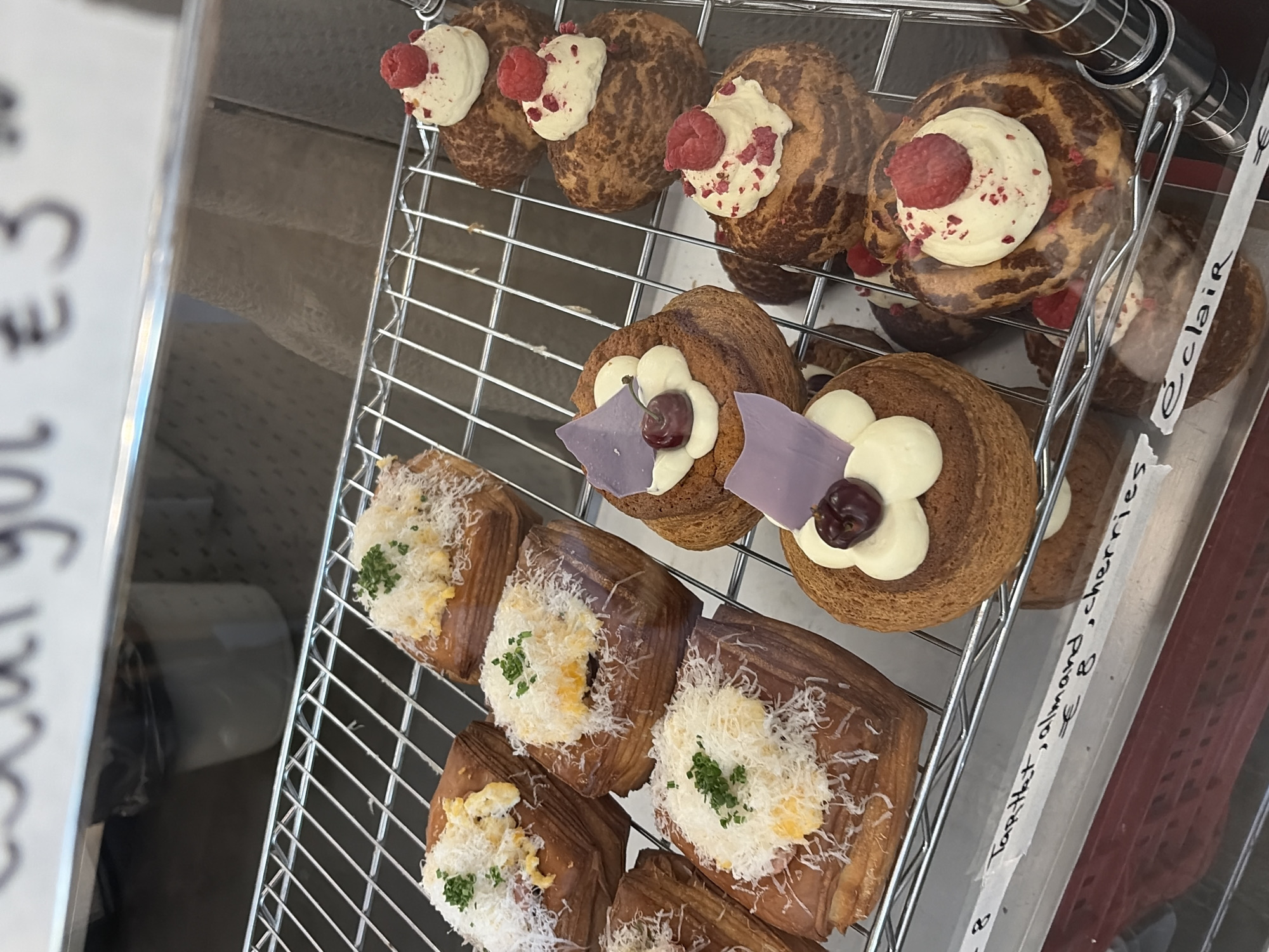 Sofia bakery displays pastries with white cream toppings