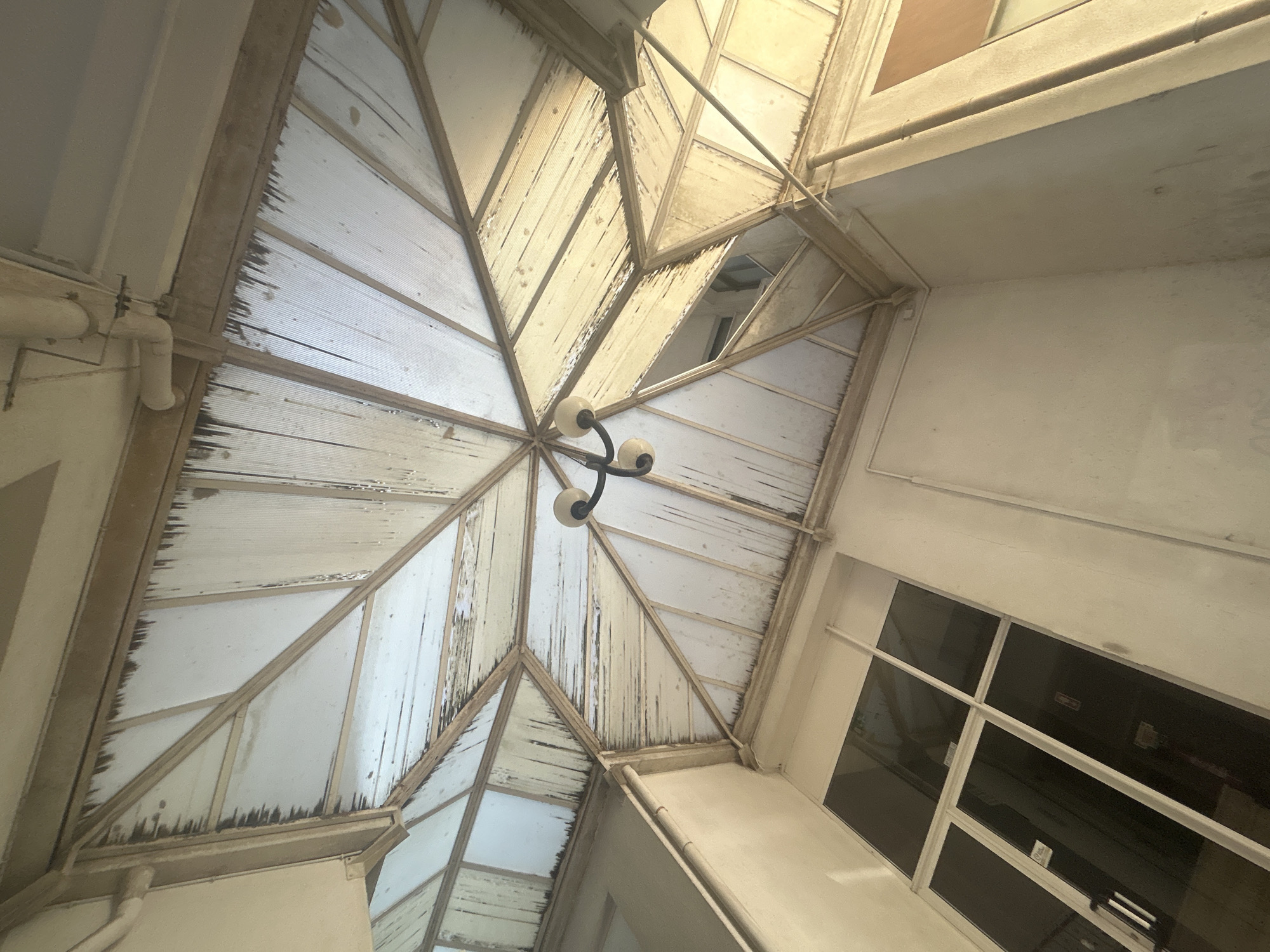 Geometric ceiling structure photographed in Santa Maria da Feira