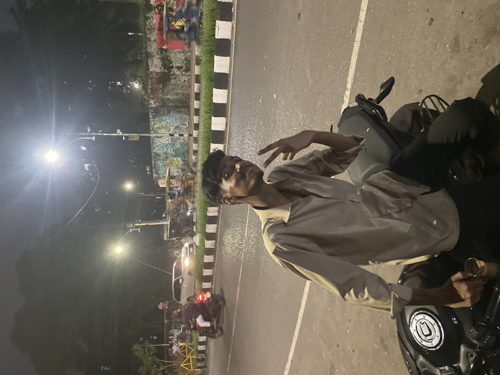 Evening street life documented across Dhaka neighborhoods