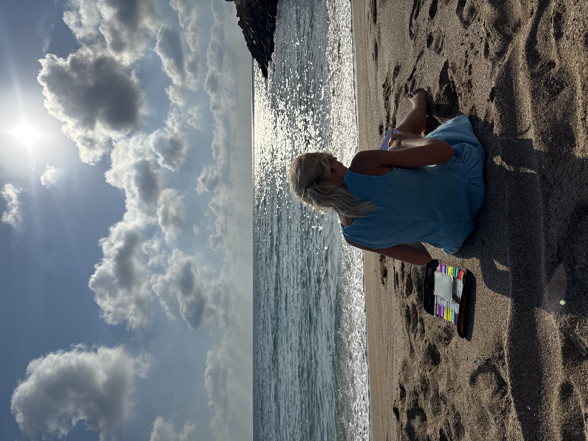 Sketching or writing solo on the shores of Nahariyya