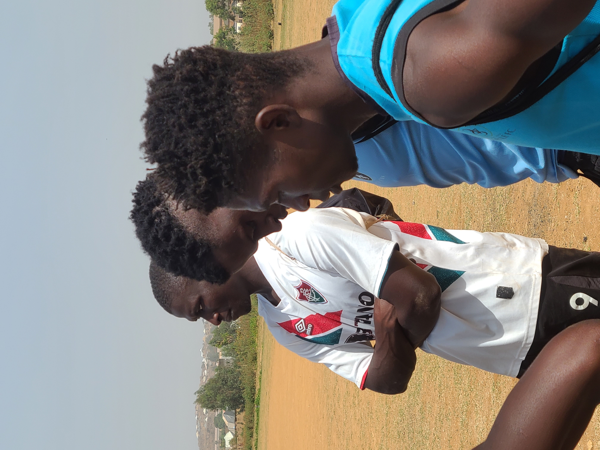 Young athletes gather for team activities on Nigerian field