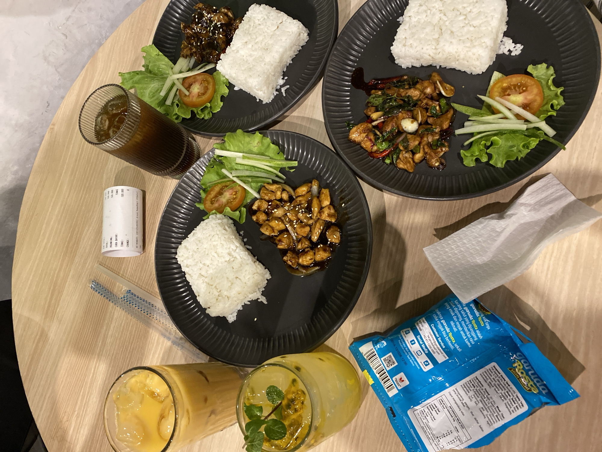 Restaurant meal documented in Madiun, Indonesia with local snacks