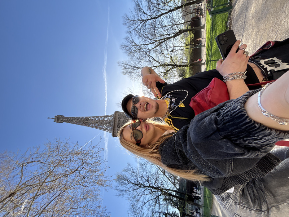 Tourist activities documented around Eiffel Tower during afternoon hours
