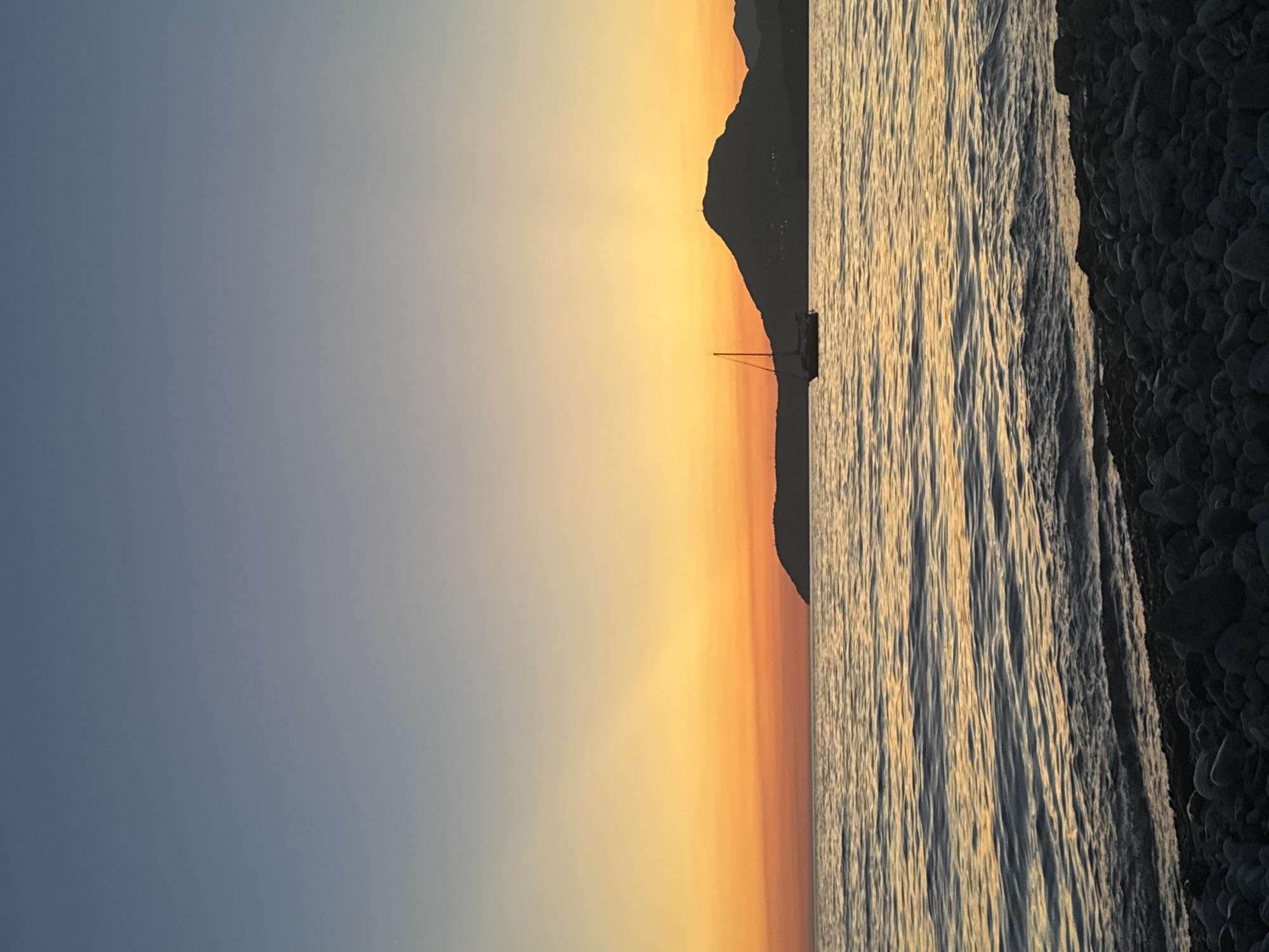 Adriatic sunset over Šušanj's pebble beach, Montenegro