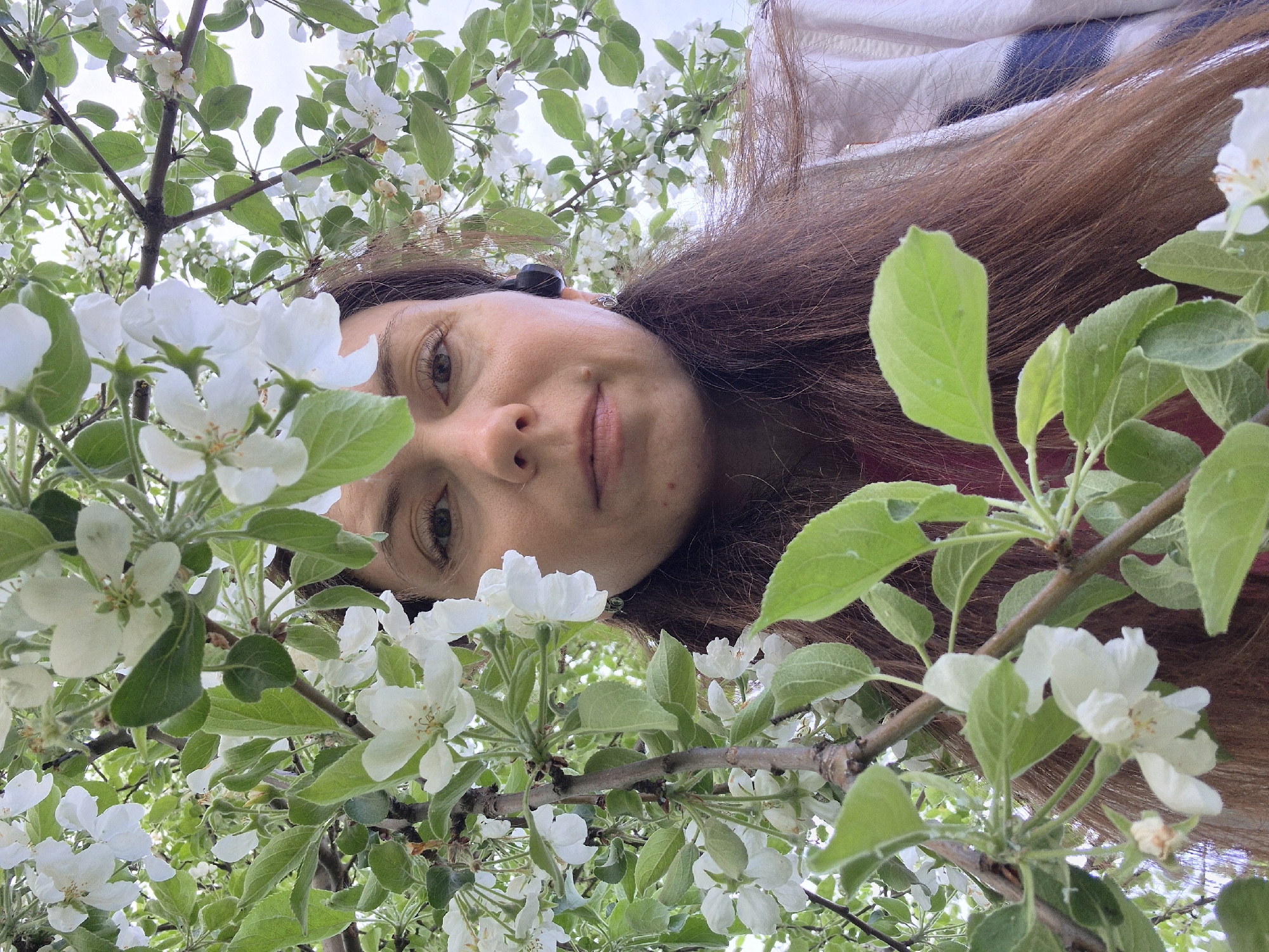 Woman spends quiet moments in urban park setting