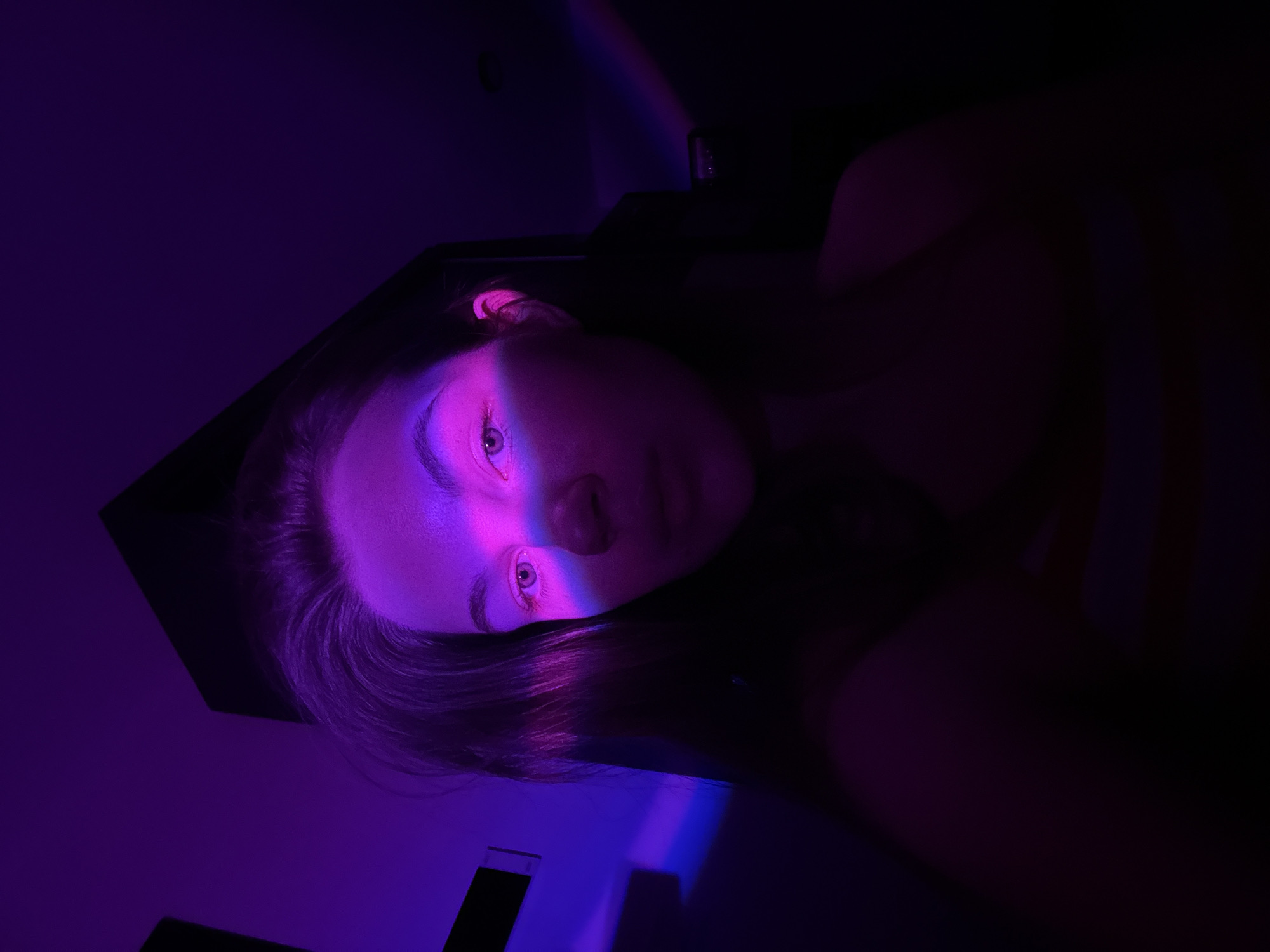 Woman filmed in colorful lighting session in Belgrade suburb