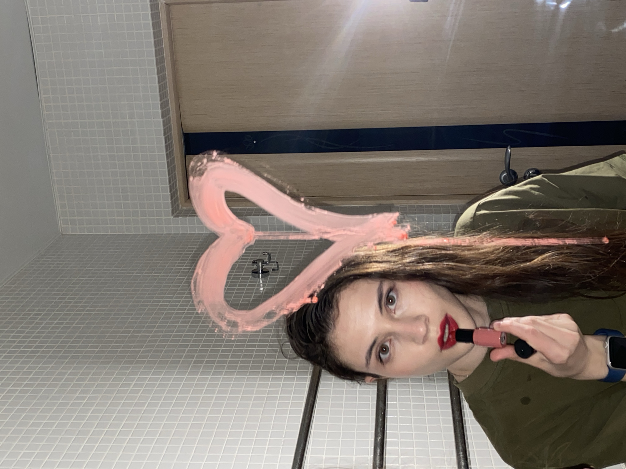 Woman Takes Multiple Mirror Selfies in Votkinsk Bathroom