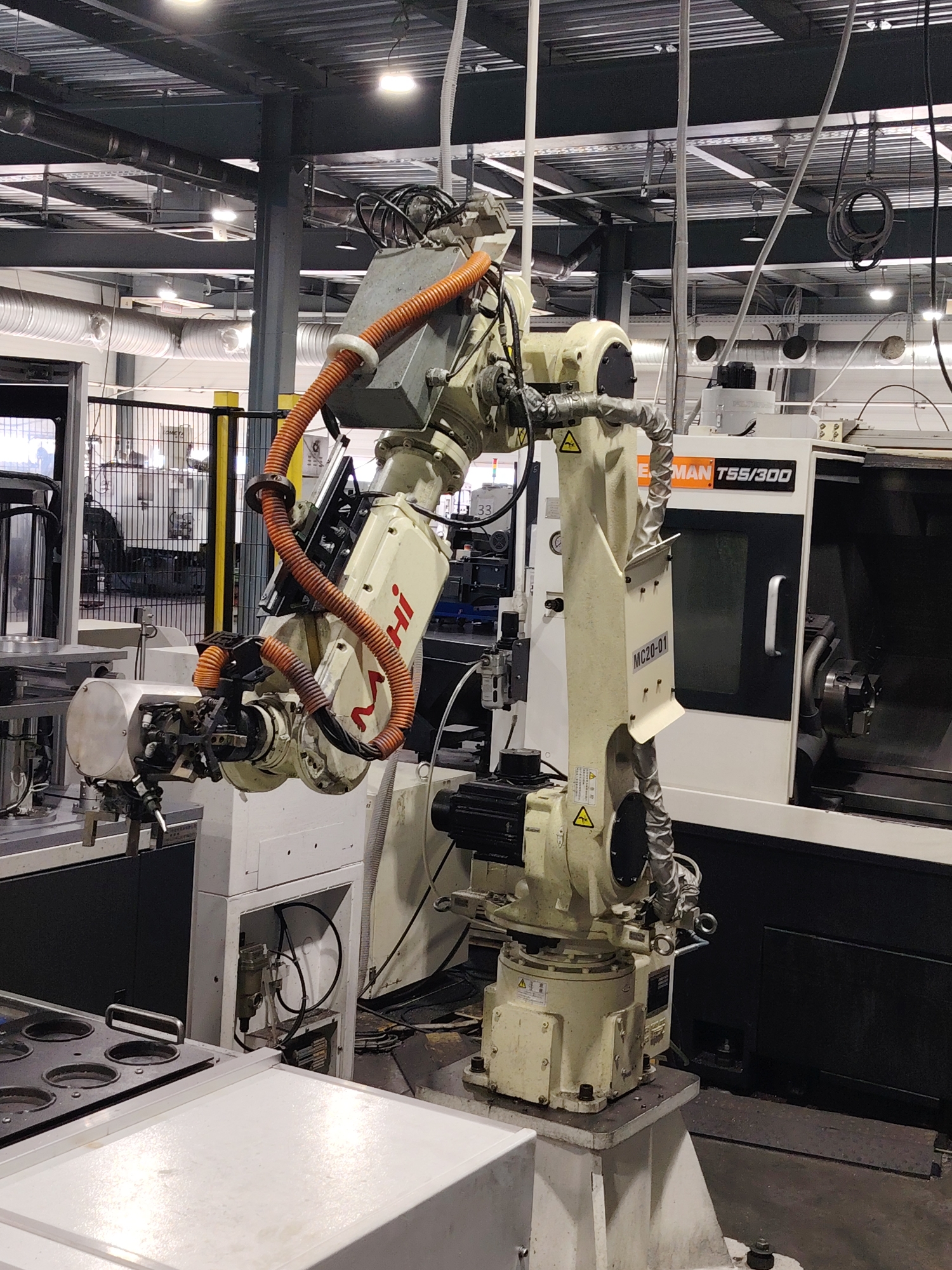 Industrial robot operates at manufacturing facility in Noviy, Russia