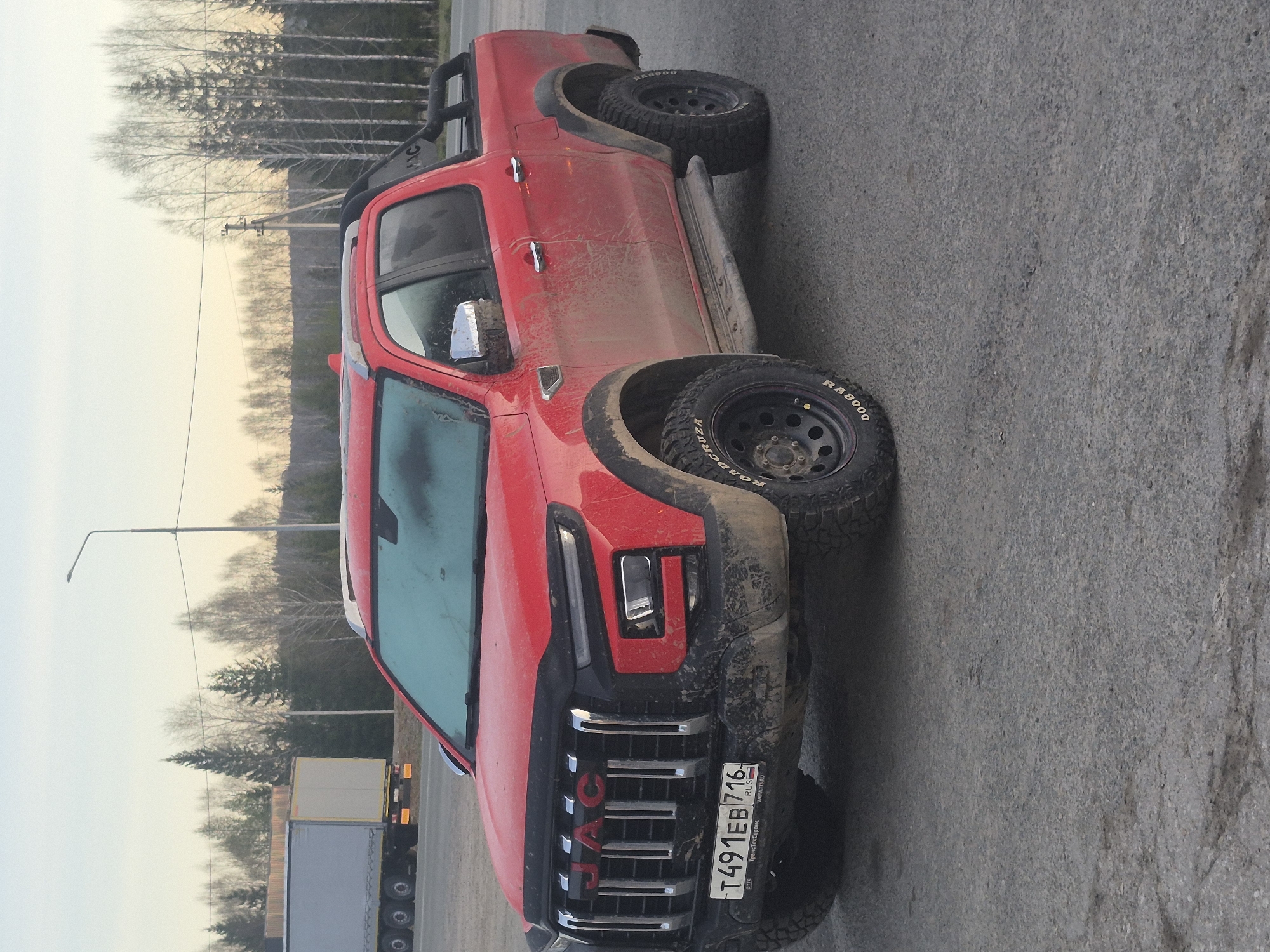Muddy pickup truck spotted near Café Inzer, Russia