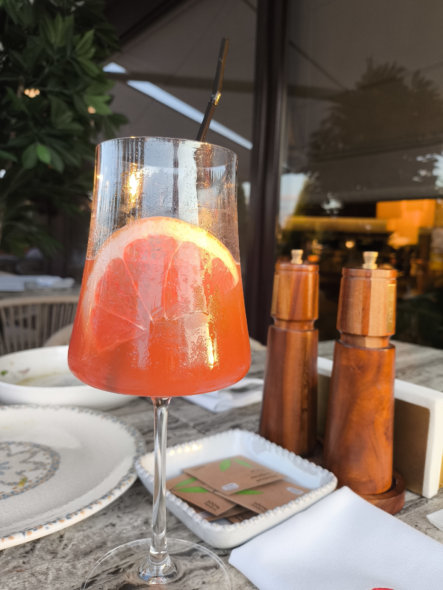 Golden hour drinks and décor at a rooftop venue