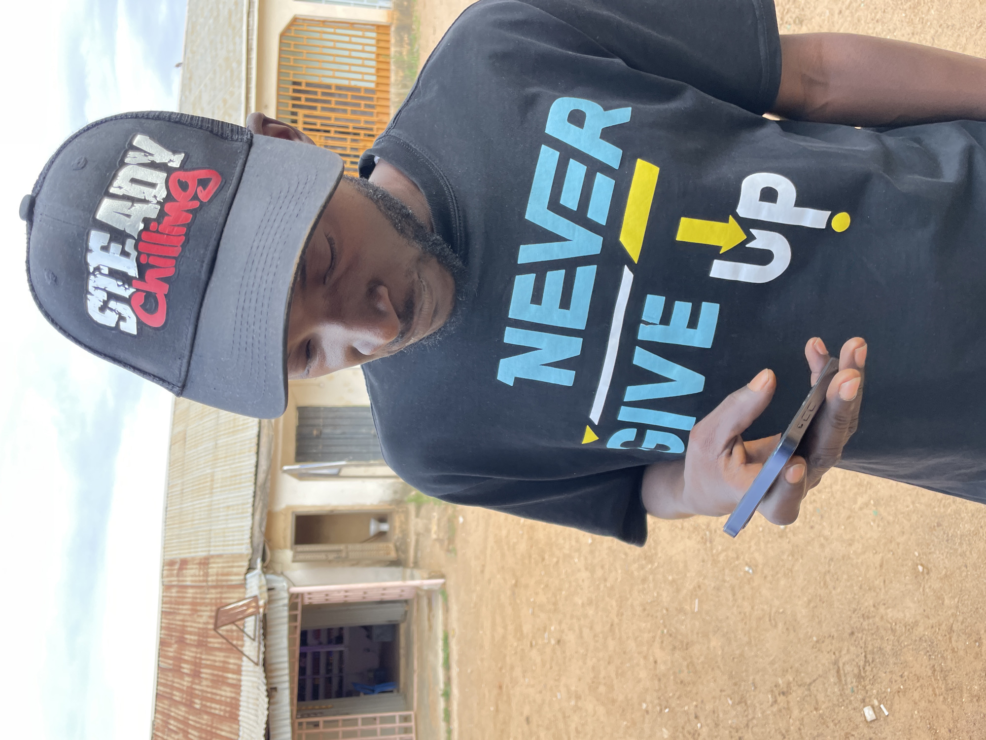Young men gather, take selfies in Barakin Akawo, Nigeria