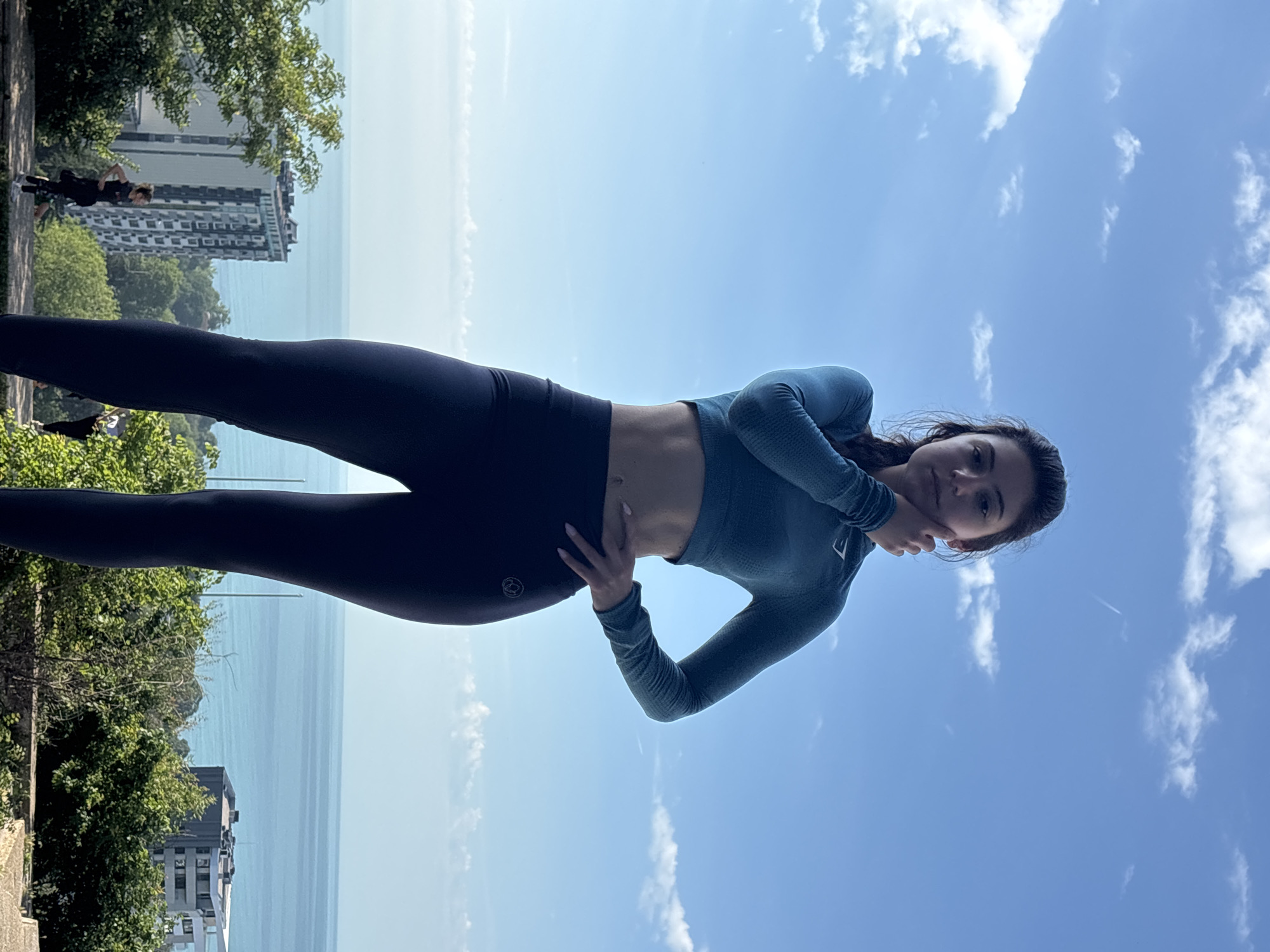 Woman performs morning yoga routine in Varna, Bulgaria