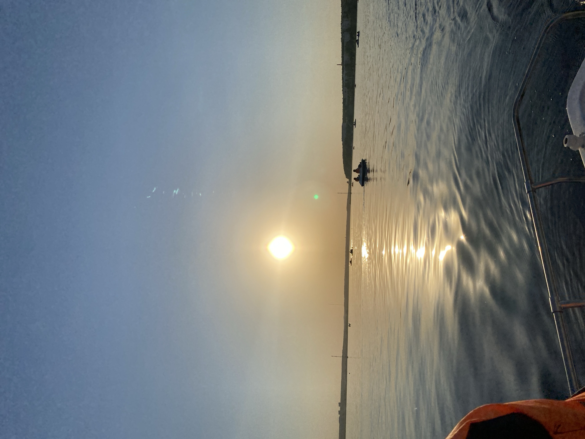 Sunset boating activities documented on Izhevsk Pond, Russia