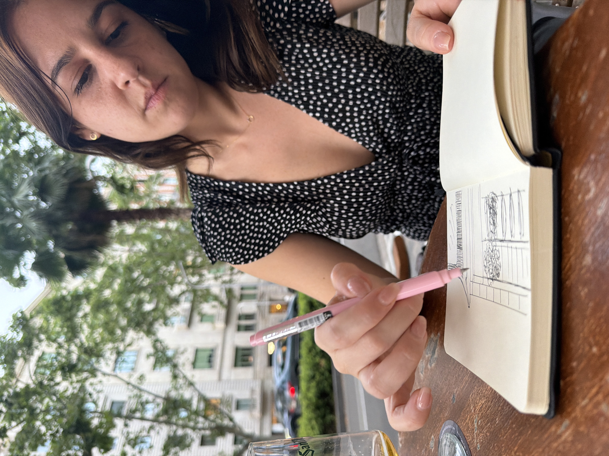 Sketching and a Pomeranian at a Barcelona café