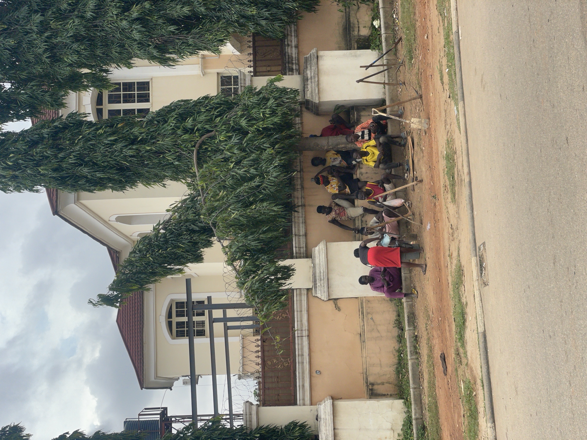 Afternoon street life along Guzape's roads, Abuja