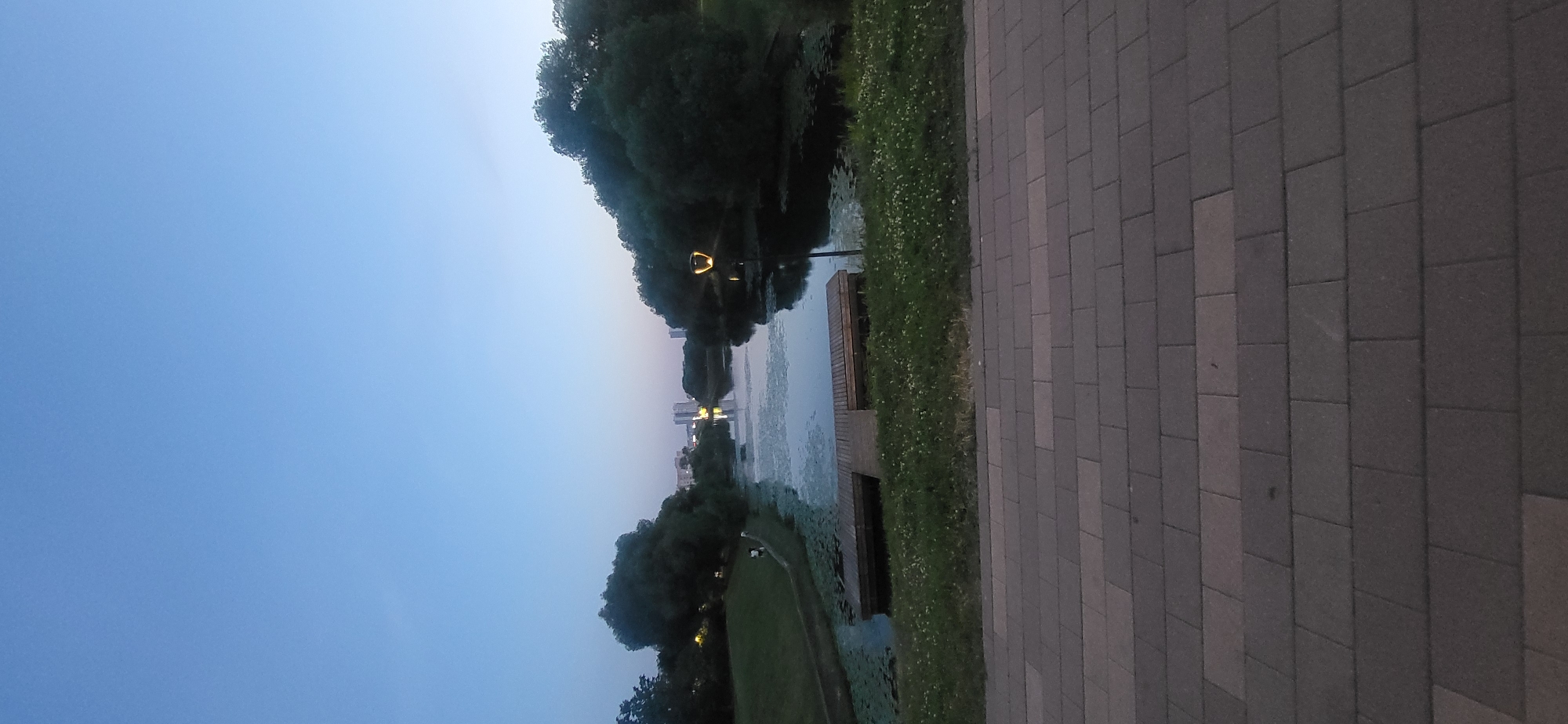 Anonymous witness documents twilight stroll through Moscow waterfront park