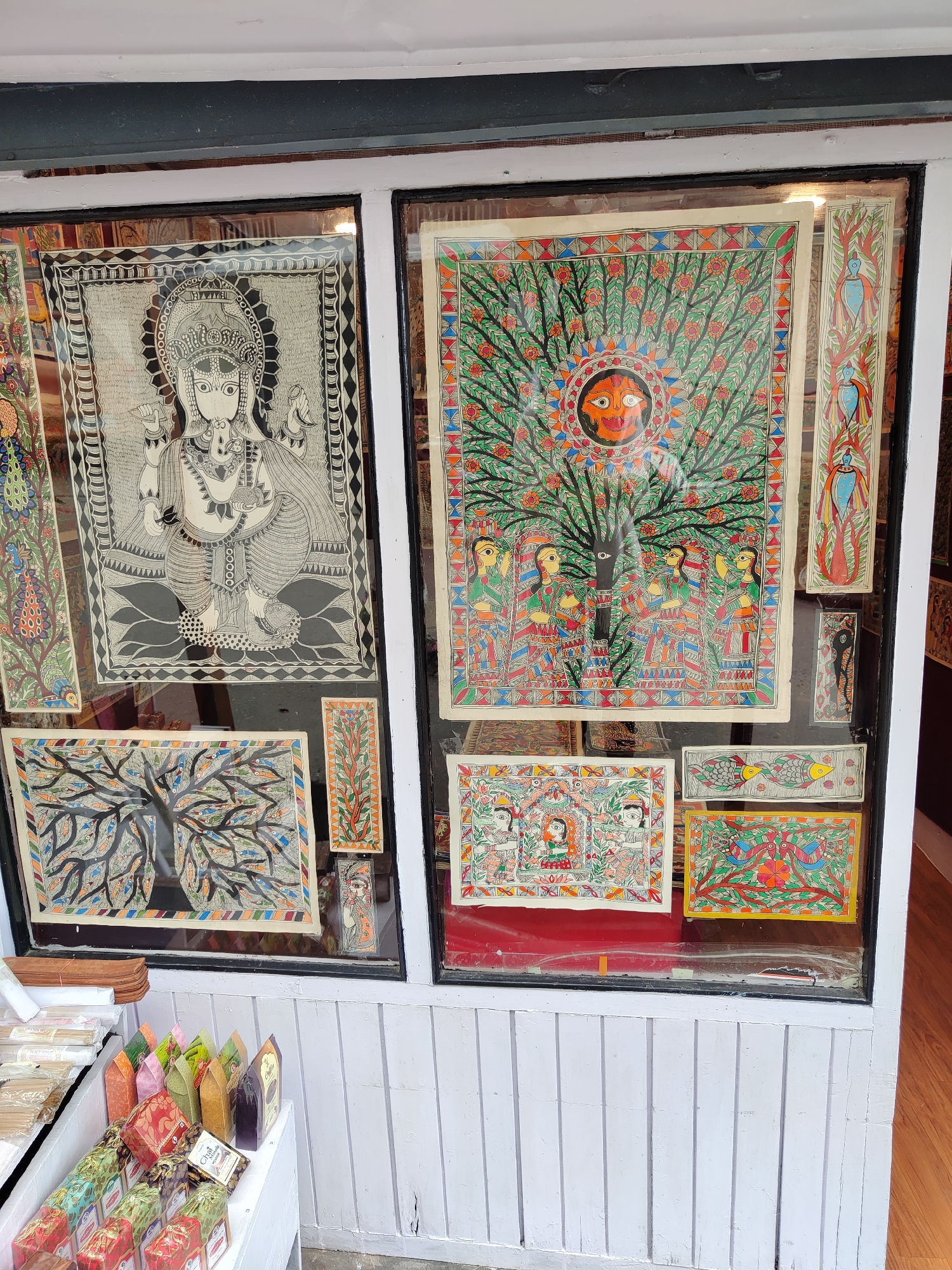 Cultural district scenes captured: folk art storefront, stone pathway