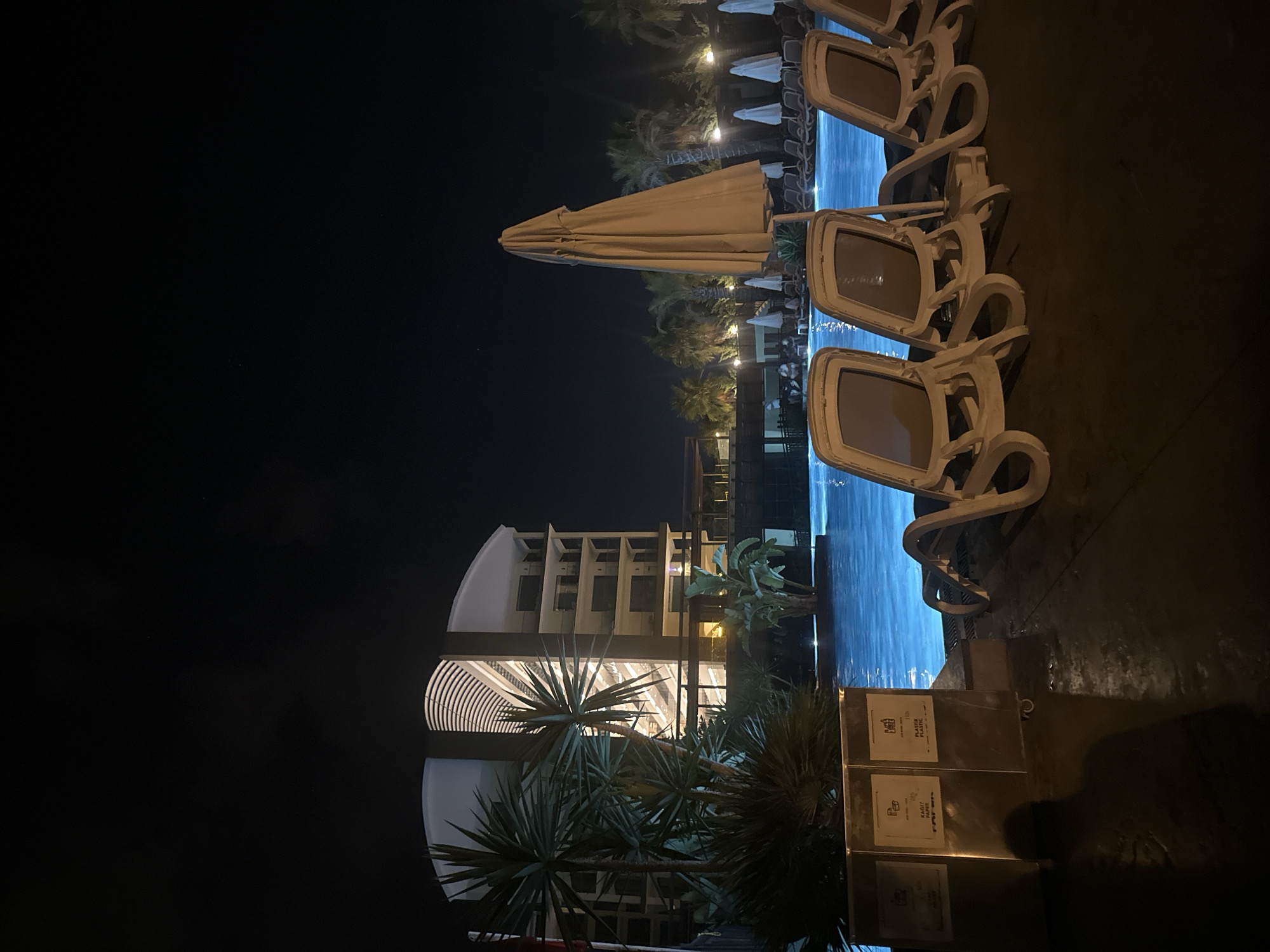 Manavgat resort at night: poolside, hotel exterior, spa hallway