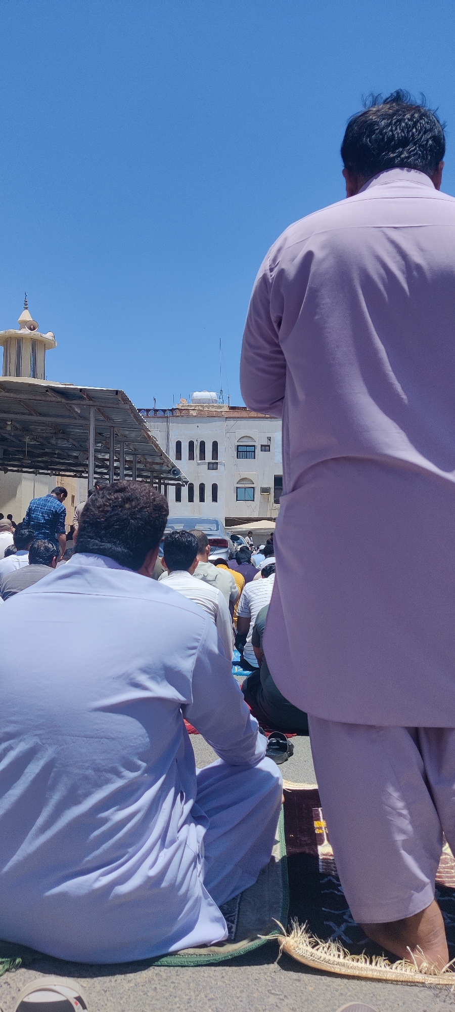 Men gather for outdoor prayer, procession in Jeddah