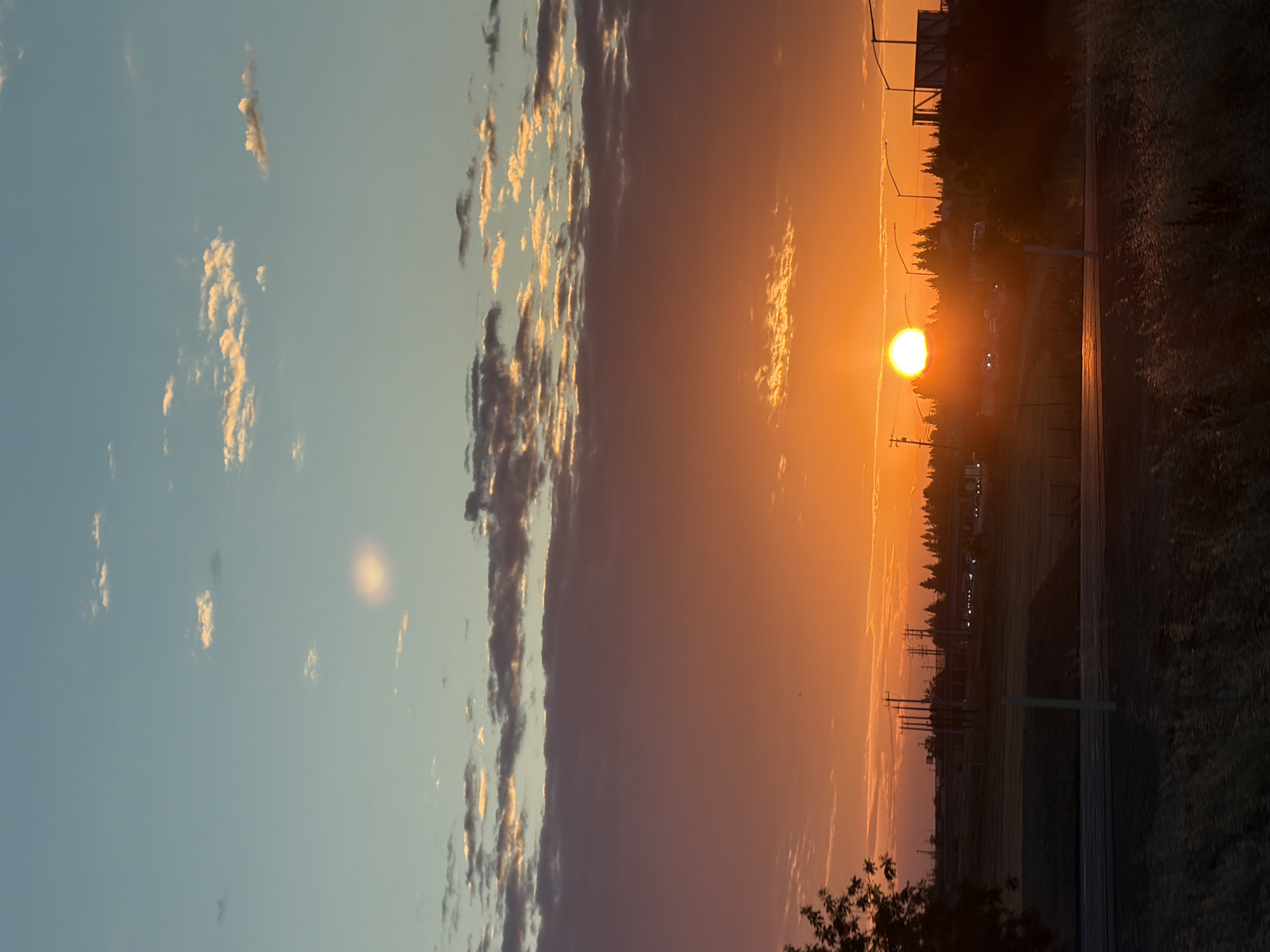 Fiery Sacramento sunset paints the sky orange and pink