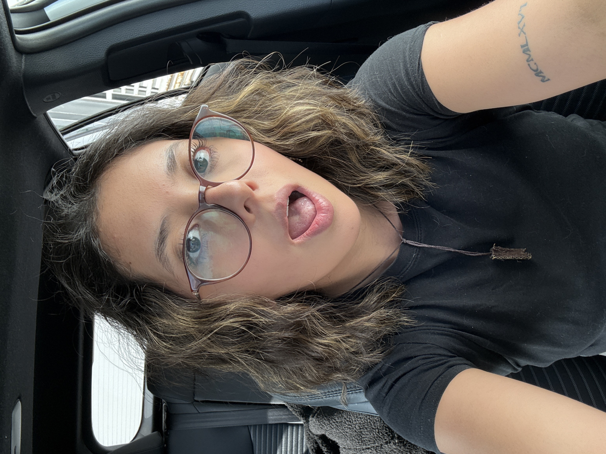 Person Takes Selfies in Car in Puebla, Mexico