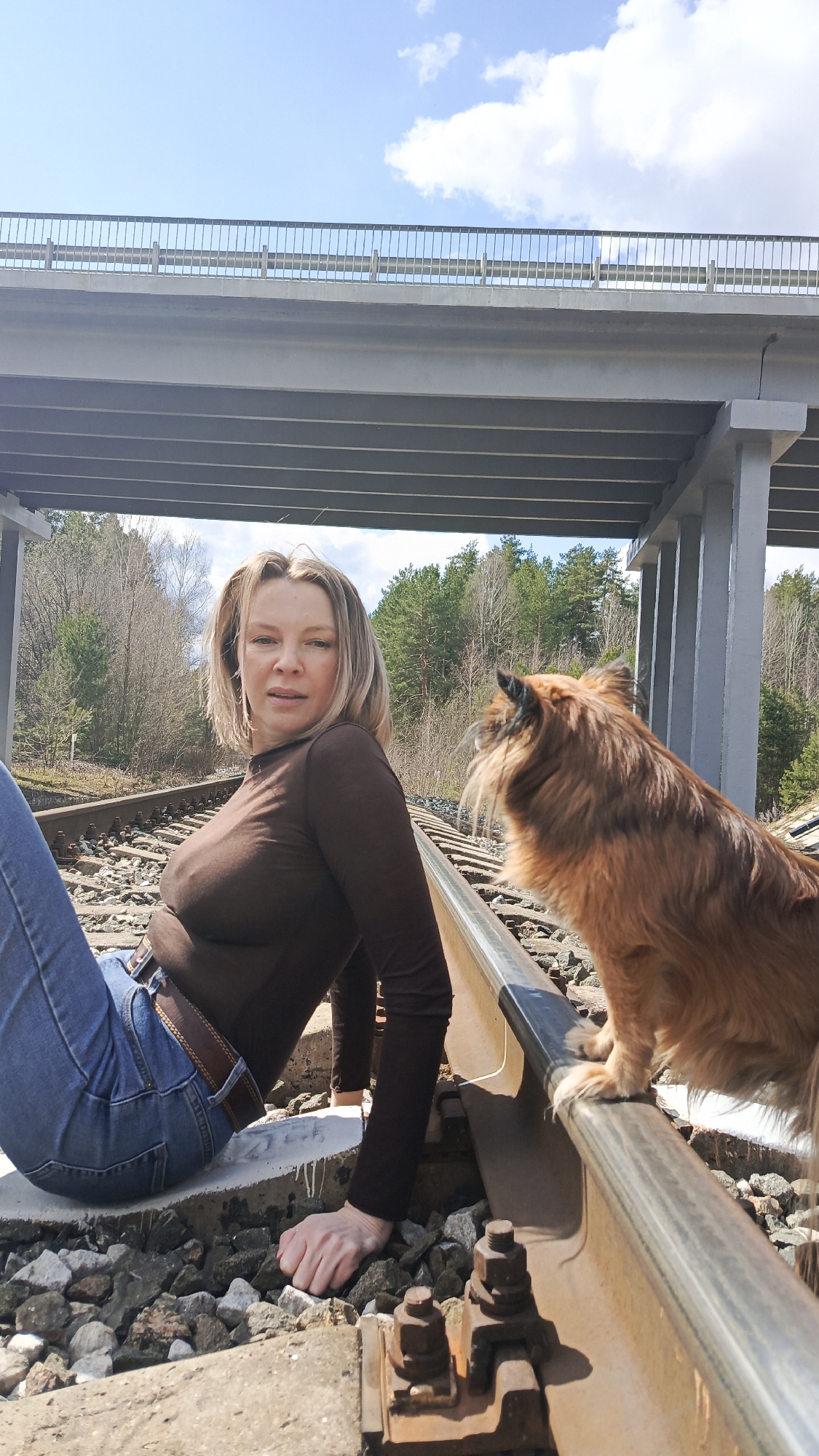 Woman and dog photographed at multiple Chaikovsky locations