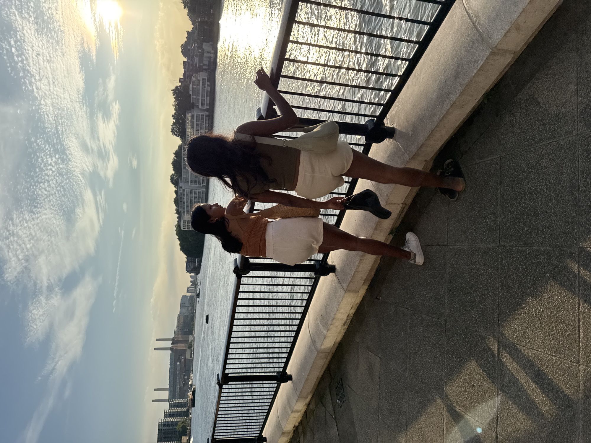 Summer evening stroll along the Thames, flowers and glass towers