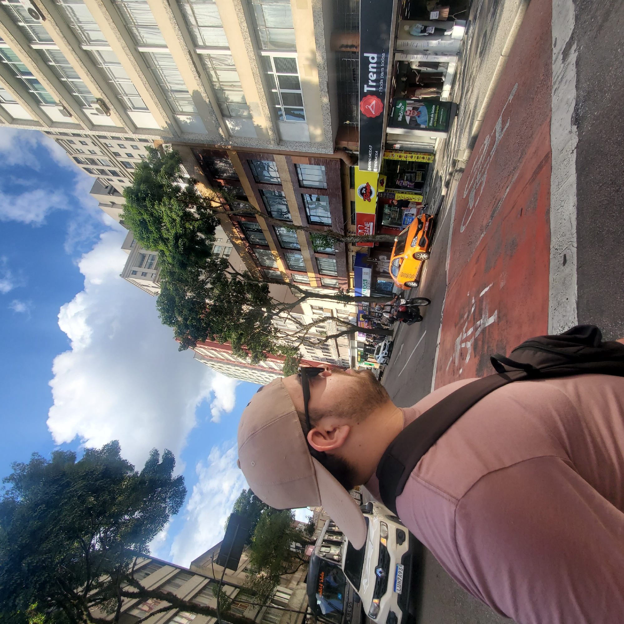 Street photography documents Curitiba's urban landscape and public art