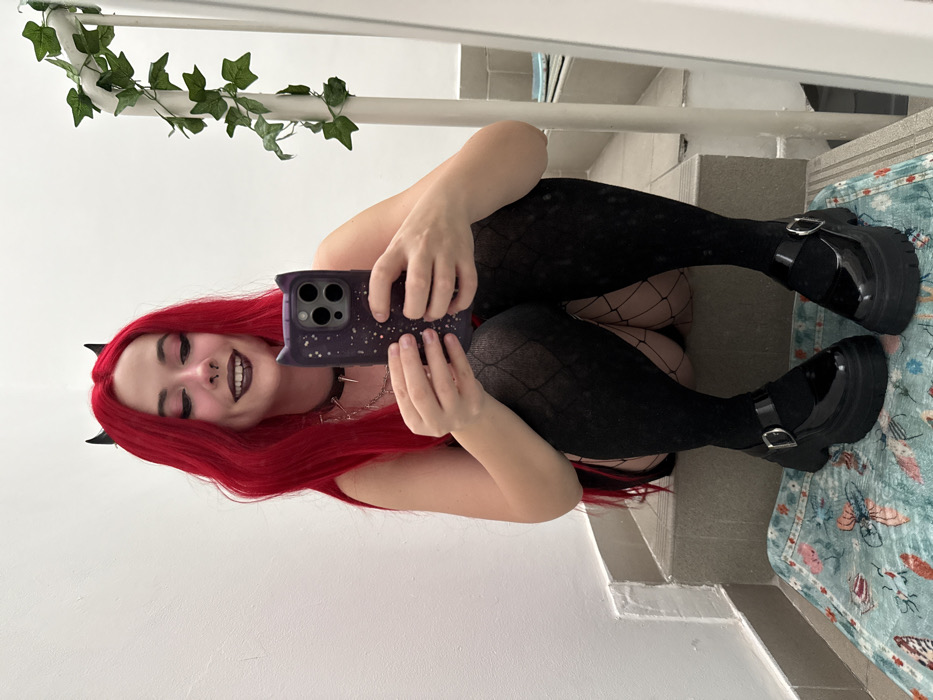 Gothic-styled person takes mirror selfies in Zagreb