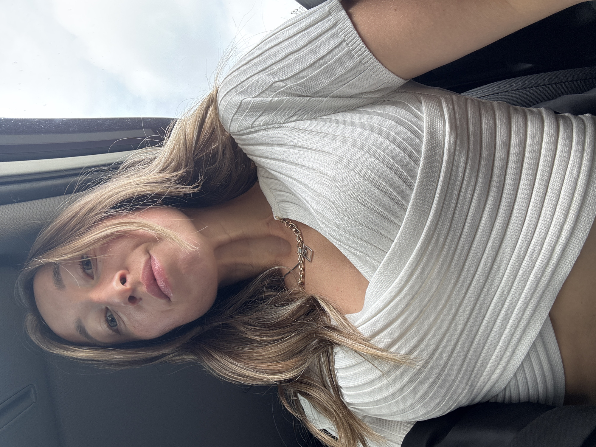 Woman documents morning car selfie session in Chaikovsky, Russia