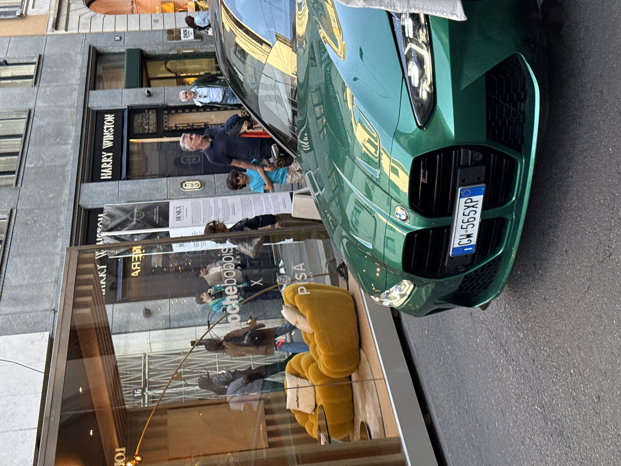 Luxury cars gather on Milan's Via Montenapoleone amid protests
