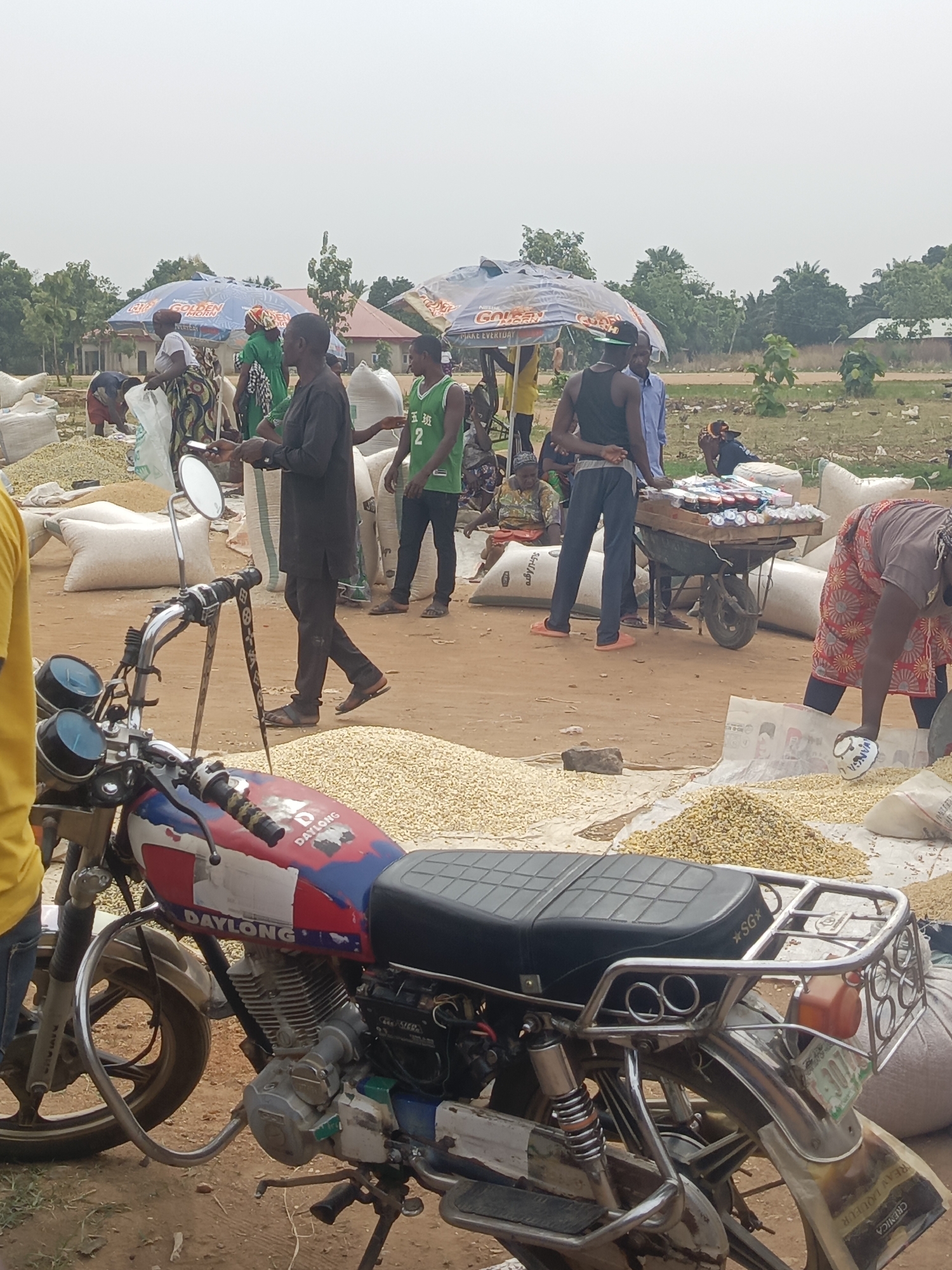Busy outdoor market documented in Andaha, Nigeria during afternoon