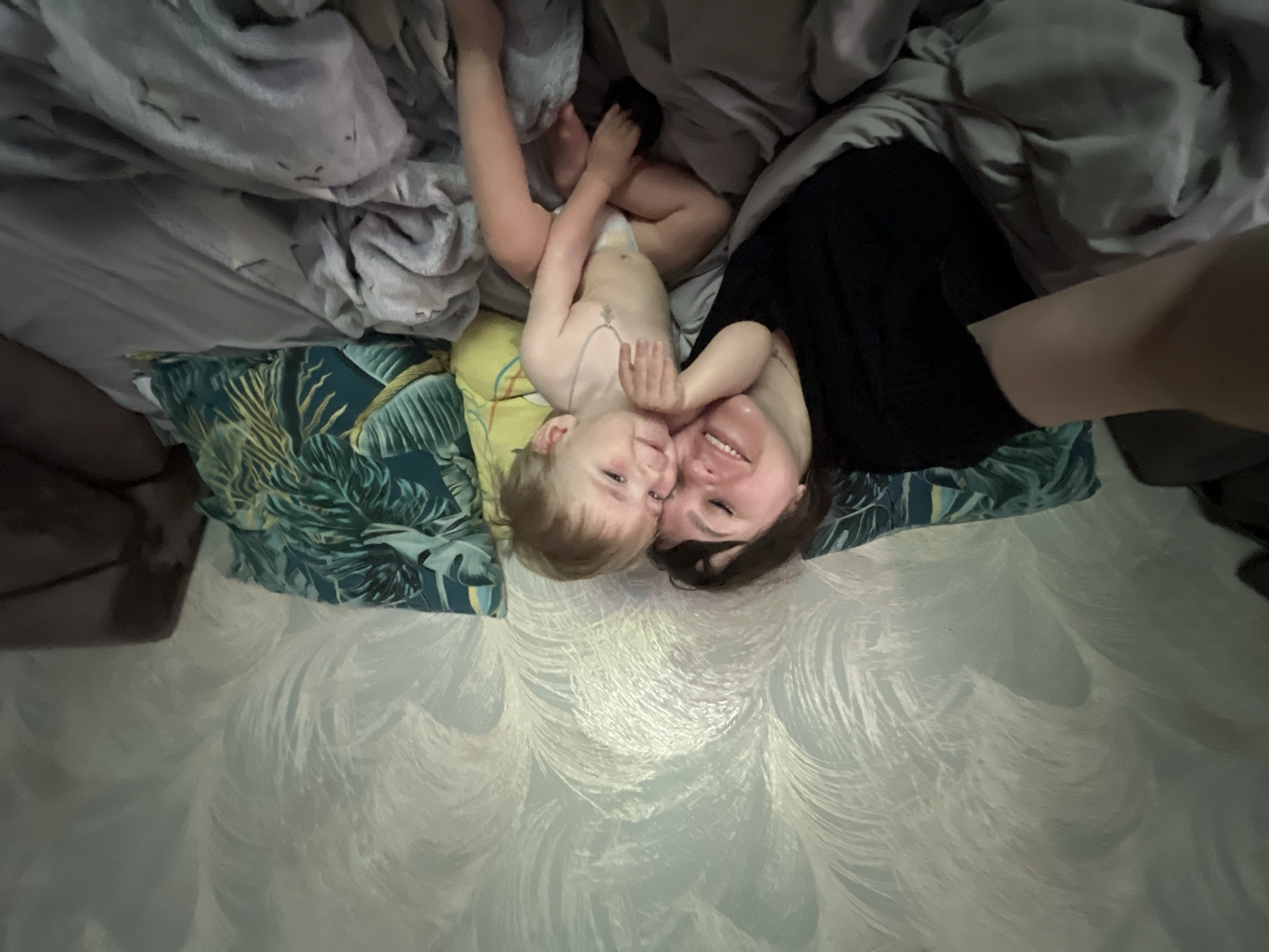 Mother and child rest in bed, Noviy Russia morning