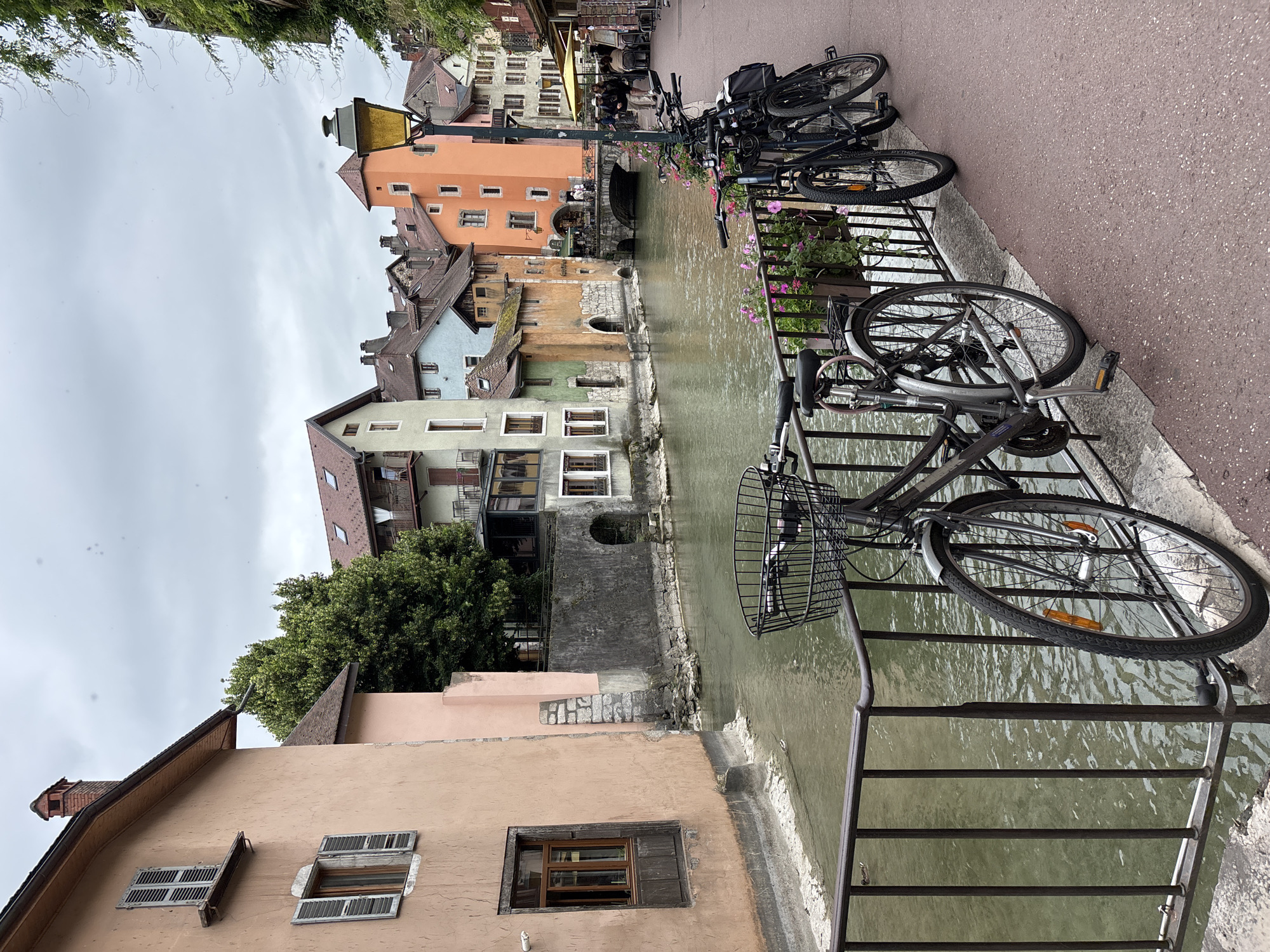 Tourist captures walking tour through Annecy's historic canals and landmarks