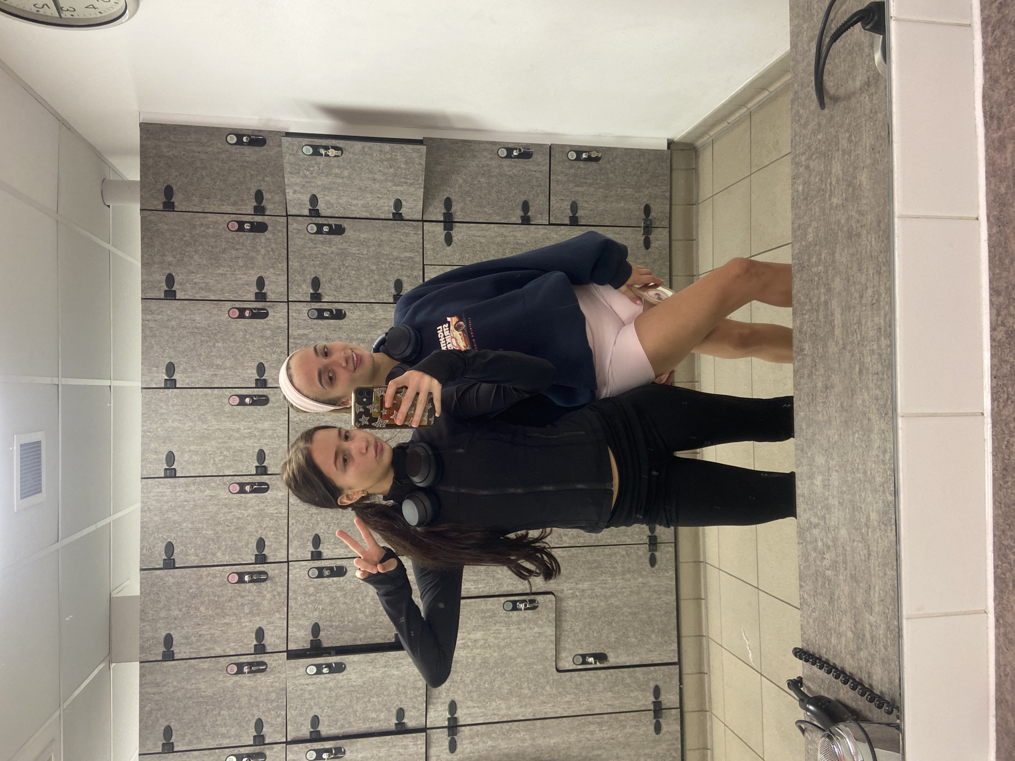 Two women take selfie in UK locker room