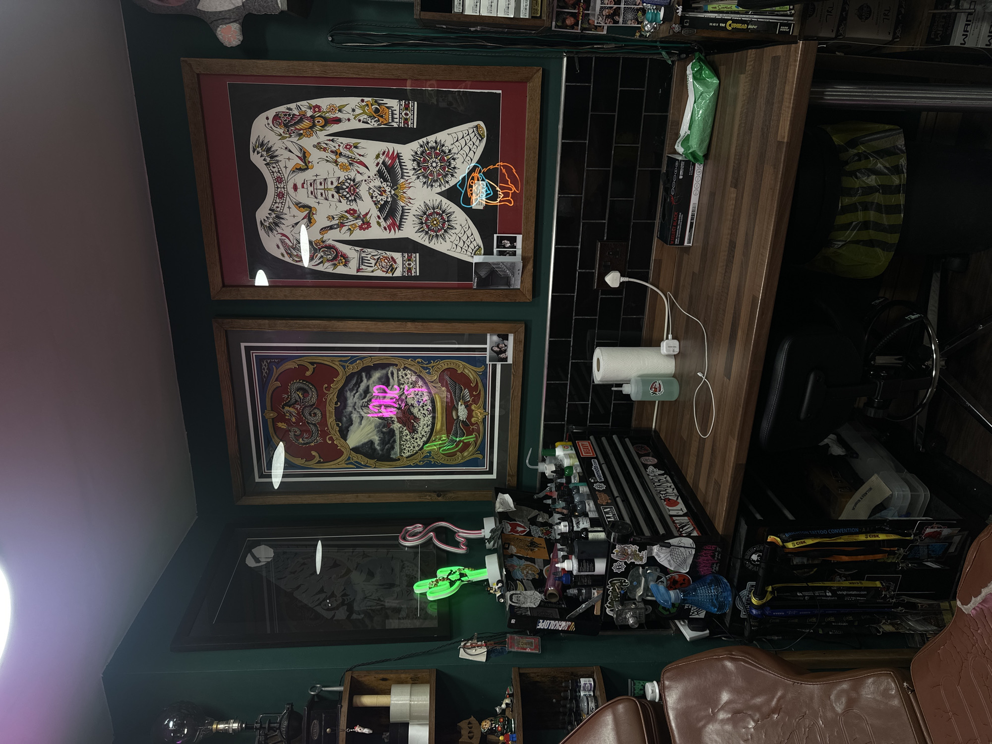 Tattoo artist workspace documented at Brighton convention