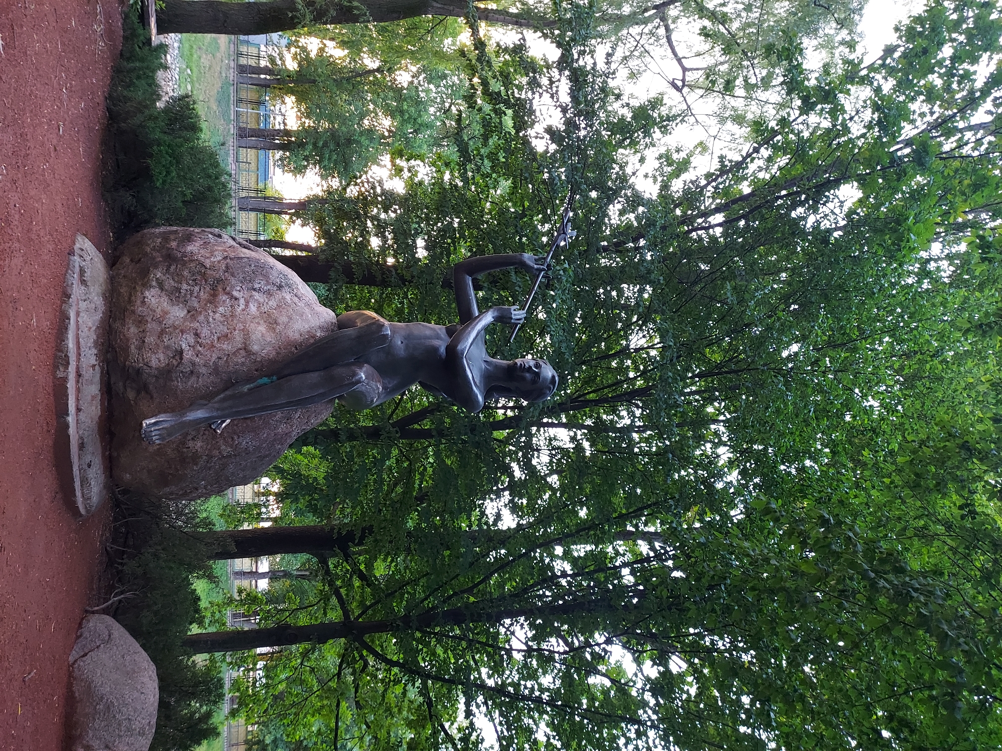 Summer evening in a Brest park — canals, ducks, cats, and dusk