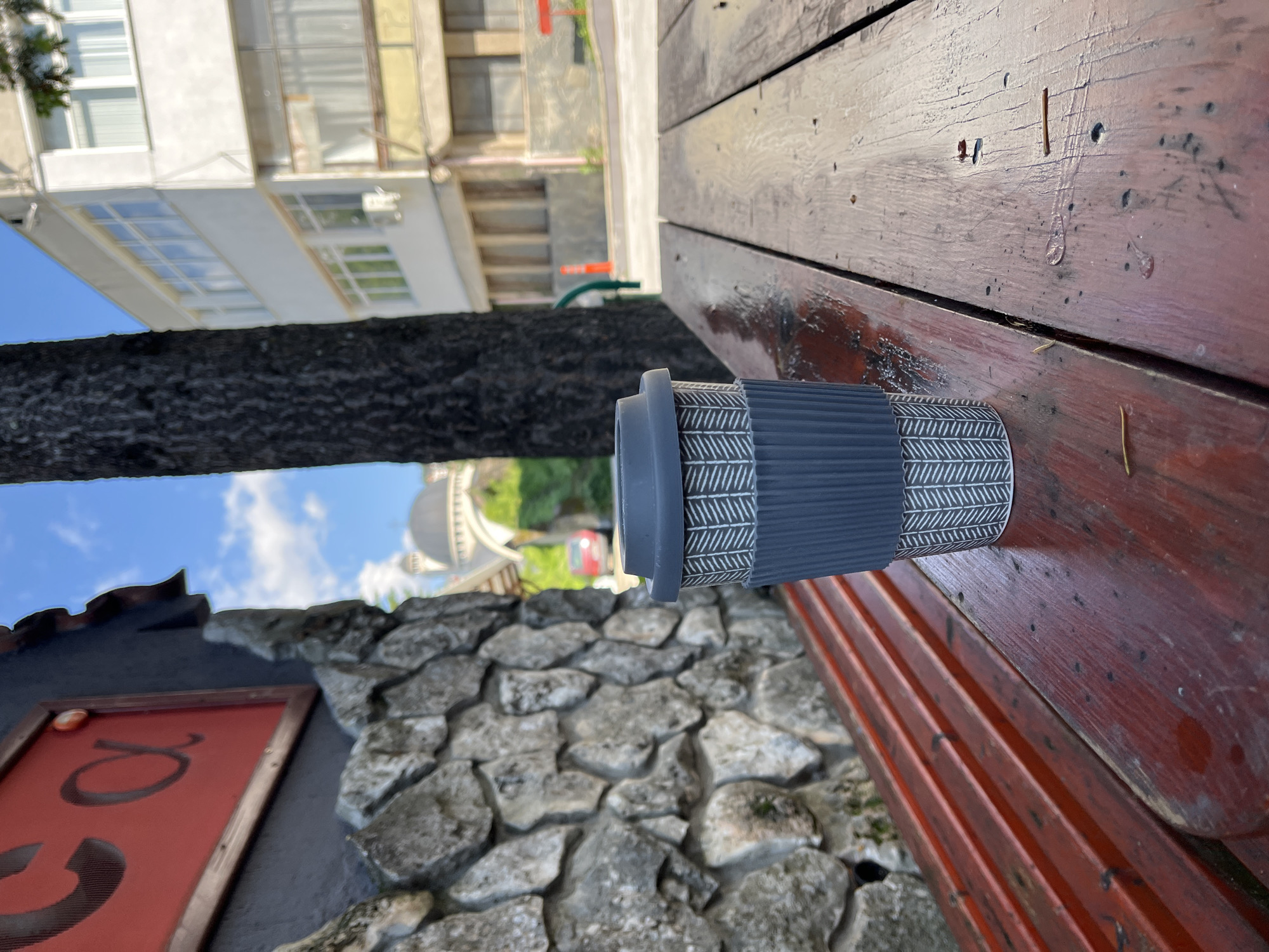 Coffee cup spotted on picnic table in Smolyan