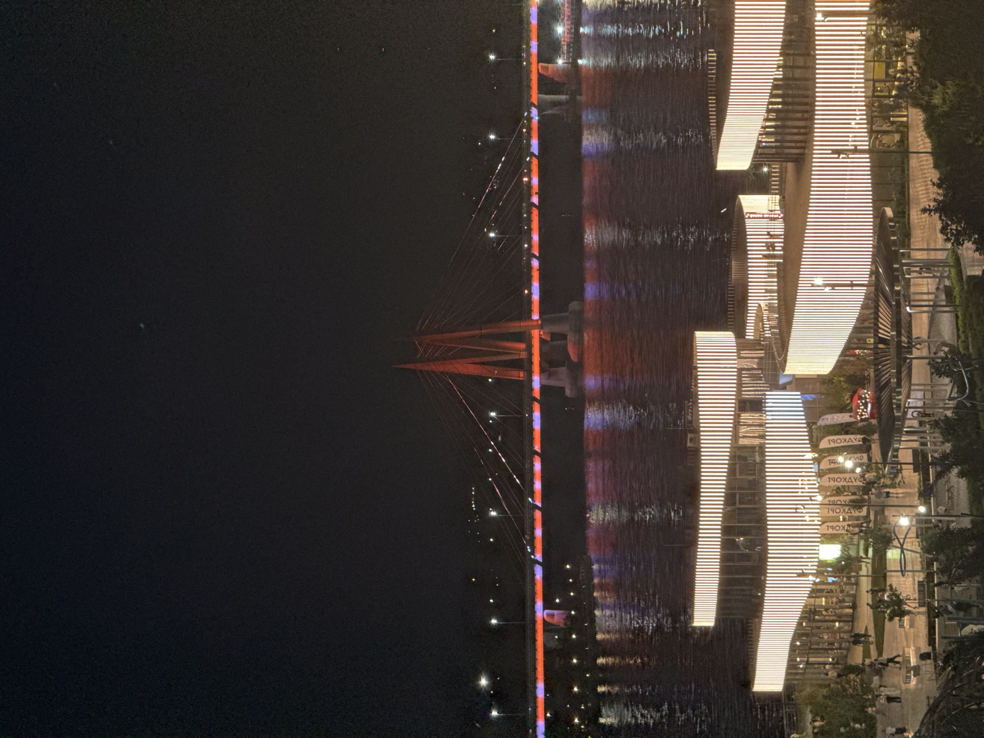 Kazan's Millennium Bridge displays colorful nighttime illumination
