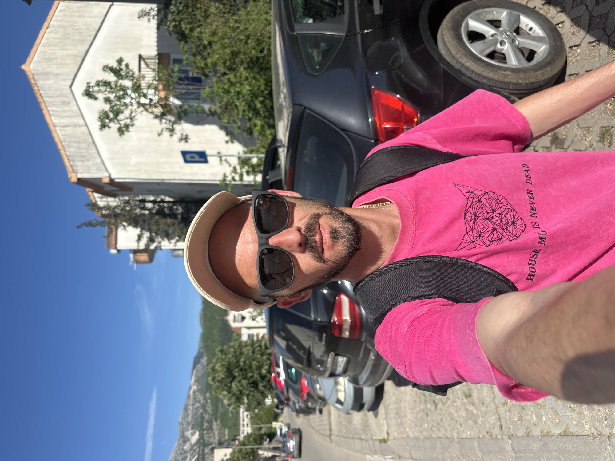 Tourist documents street scenes and shopping in Budva, Montenegro