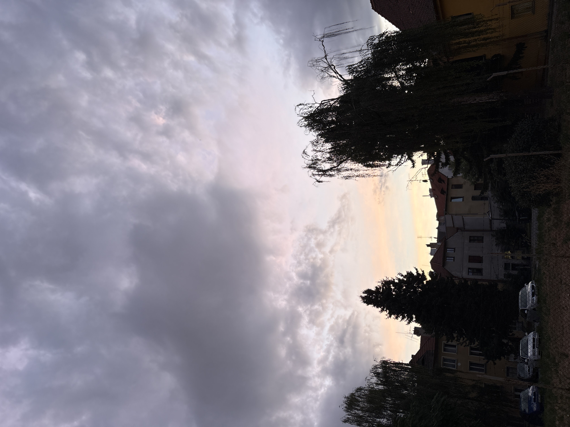 Dusk settles over a European town square and surrounding streets