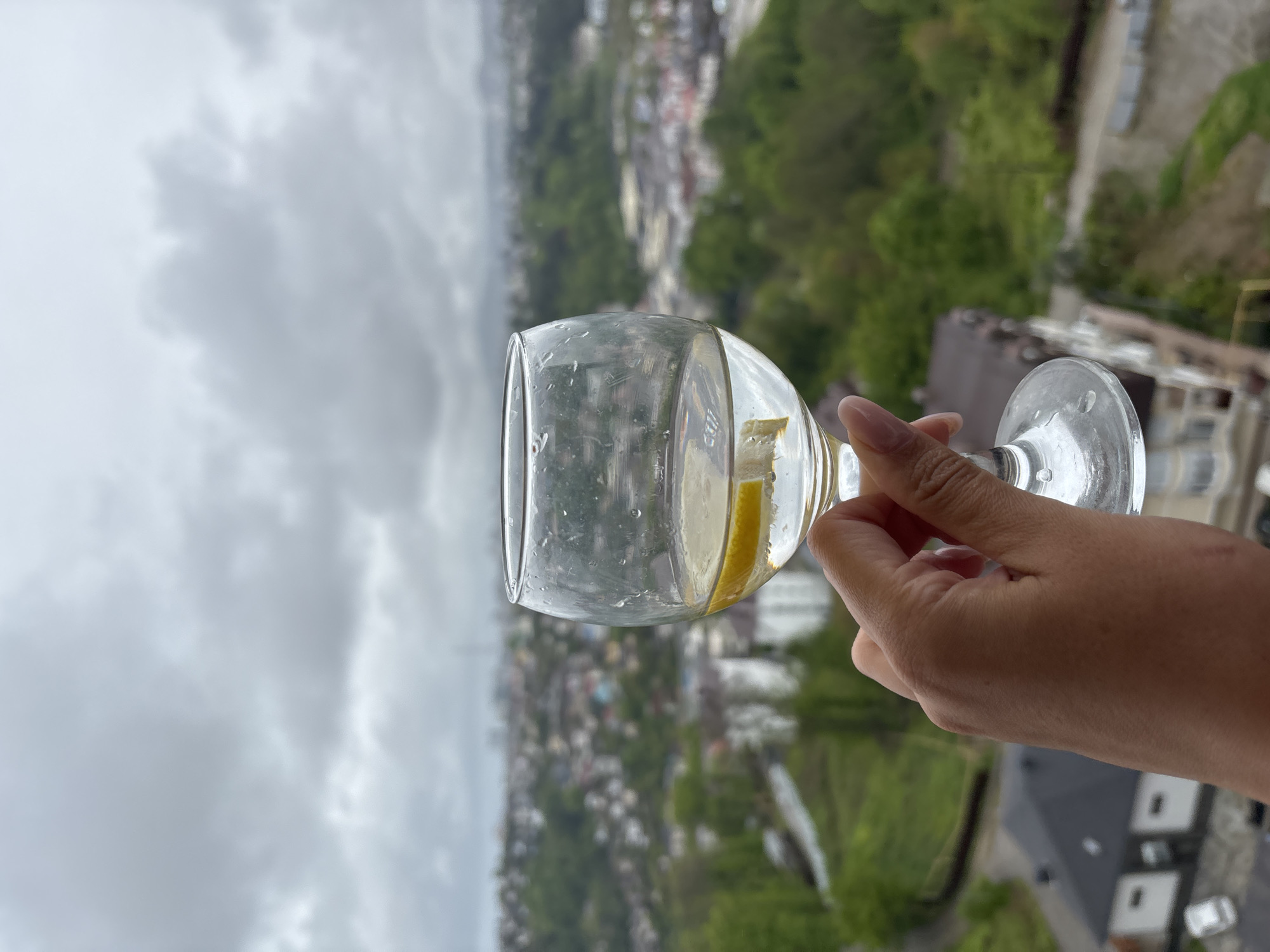 Morning moments: Woman with baby enjoys drink on Sochi balcony