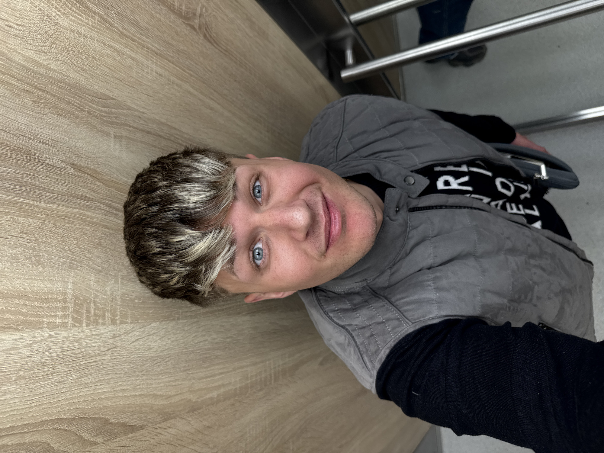Man poses for photos with laptop case in Plovdiv